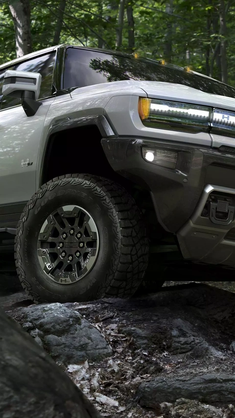Hummer EV Truck Off-roading in Forest