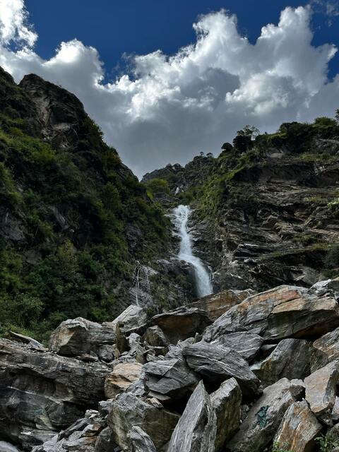 Mountain Waterfall Between Rocky Cliffs