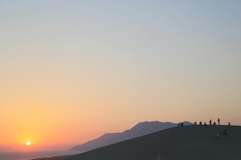 Sunset Over Coastal Sand Dune