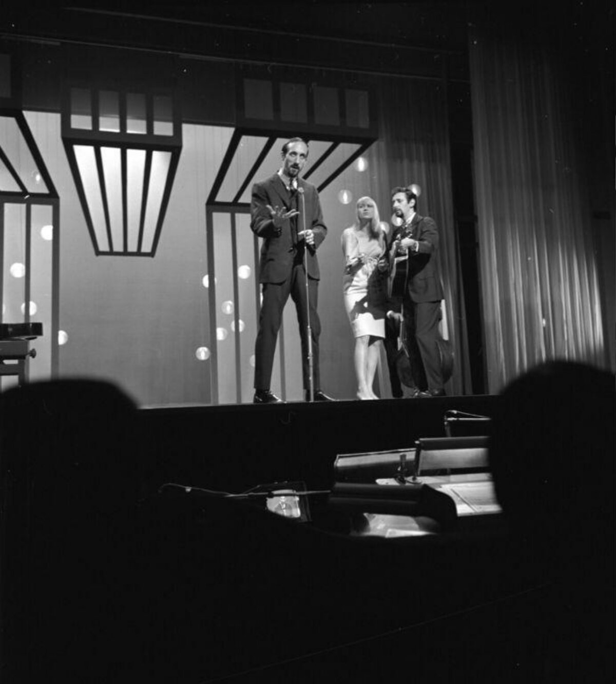 Three Performers on Stage