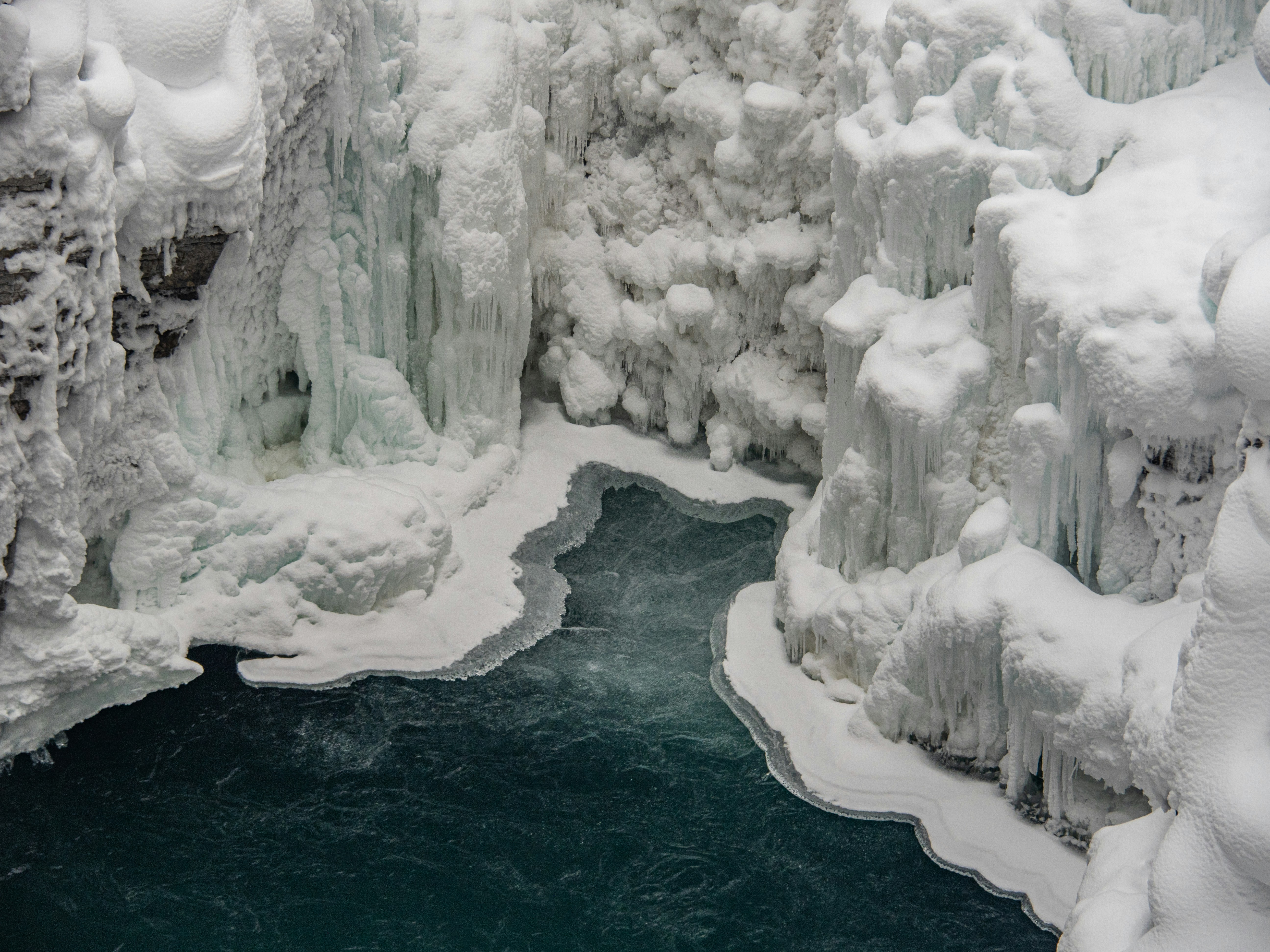 Snow-covered Icy Gorge River