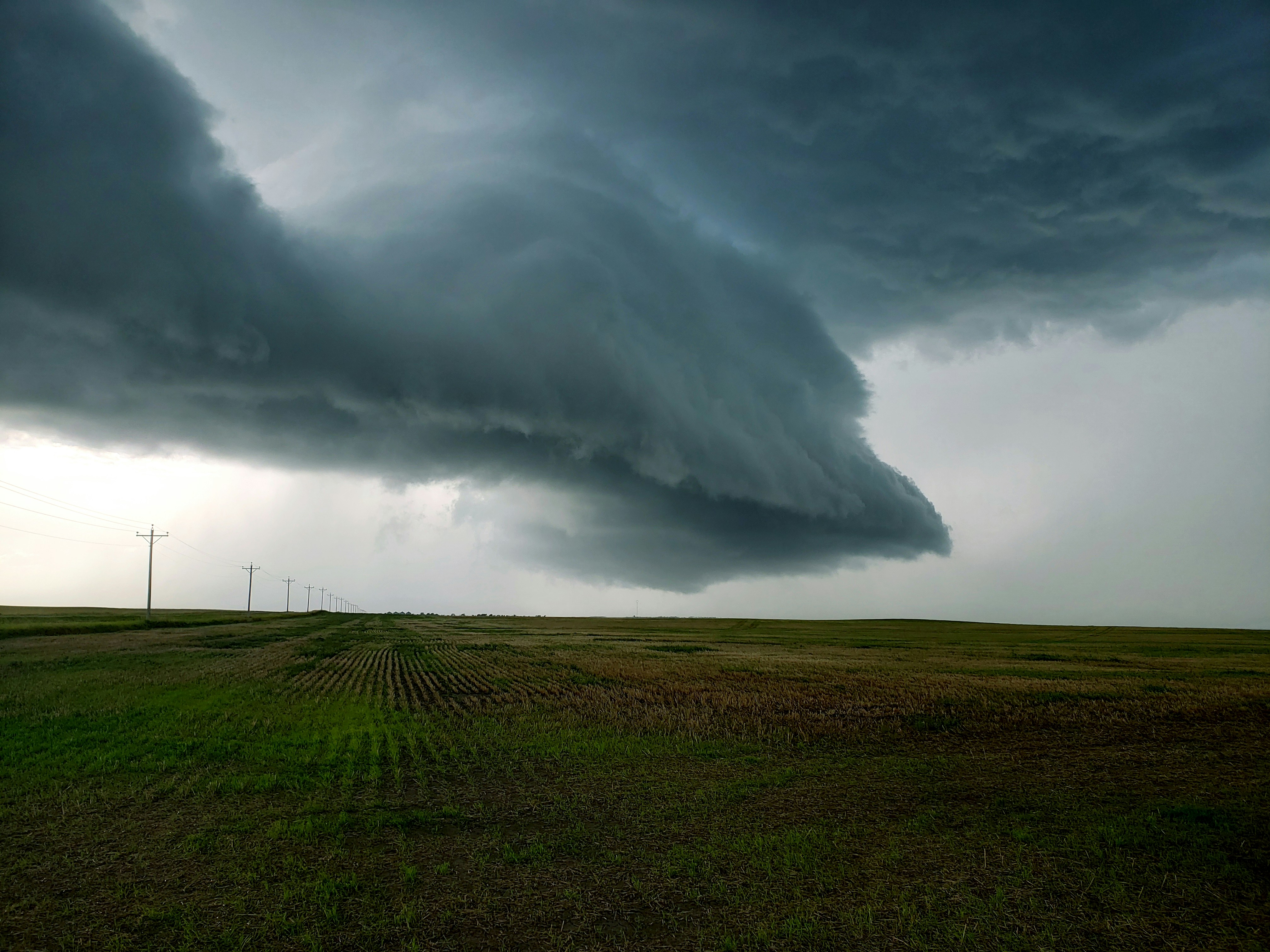 Storm Cloud Over Plain Farmland
