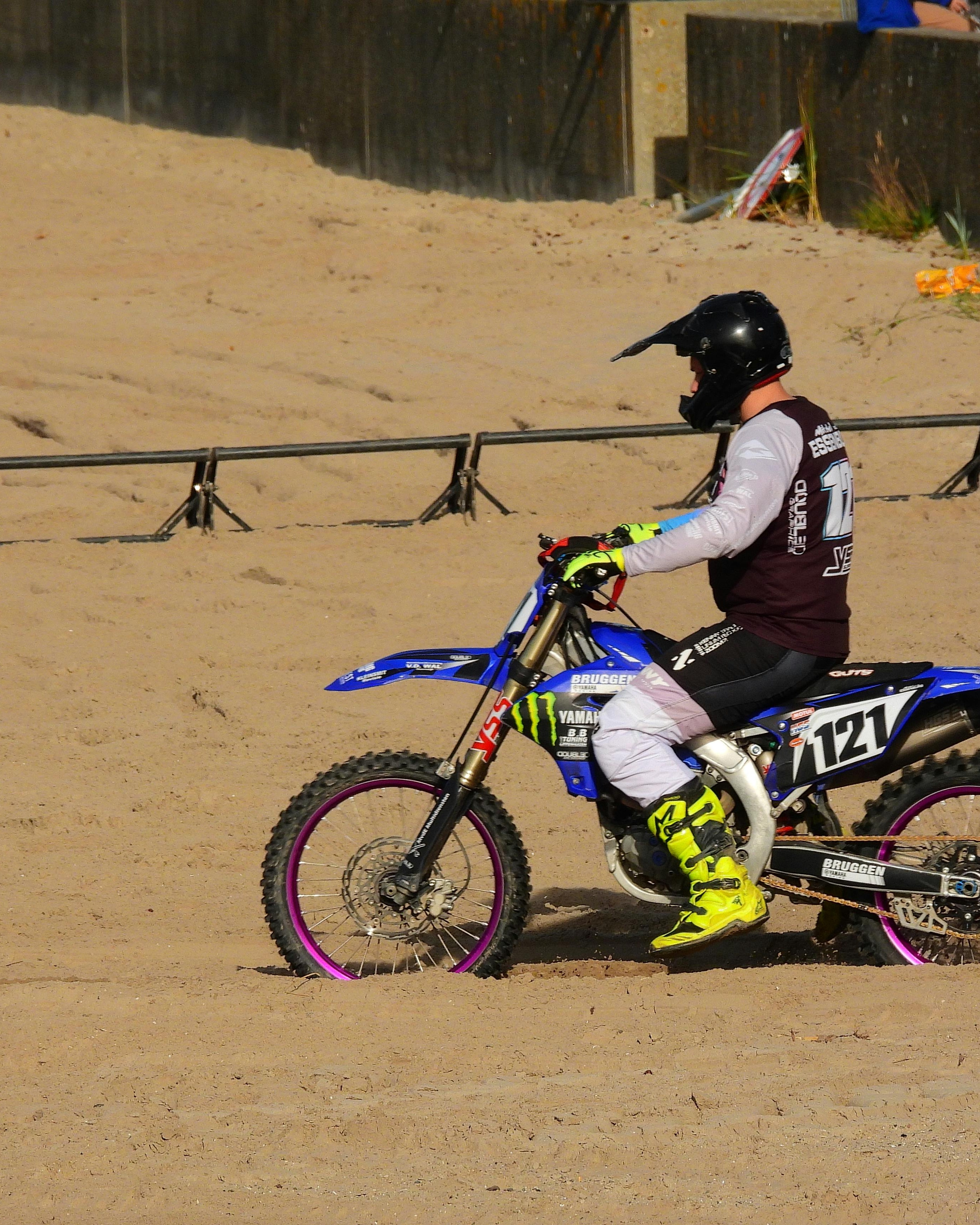 Motocross Rider on Sandy Race Track