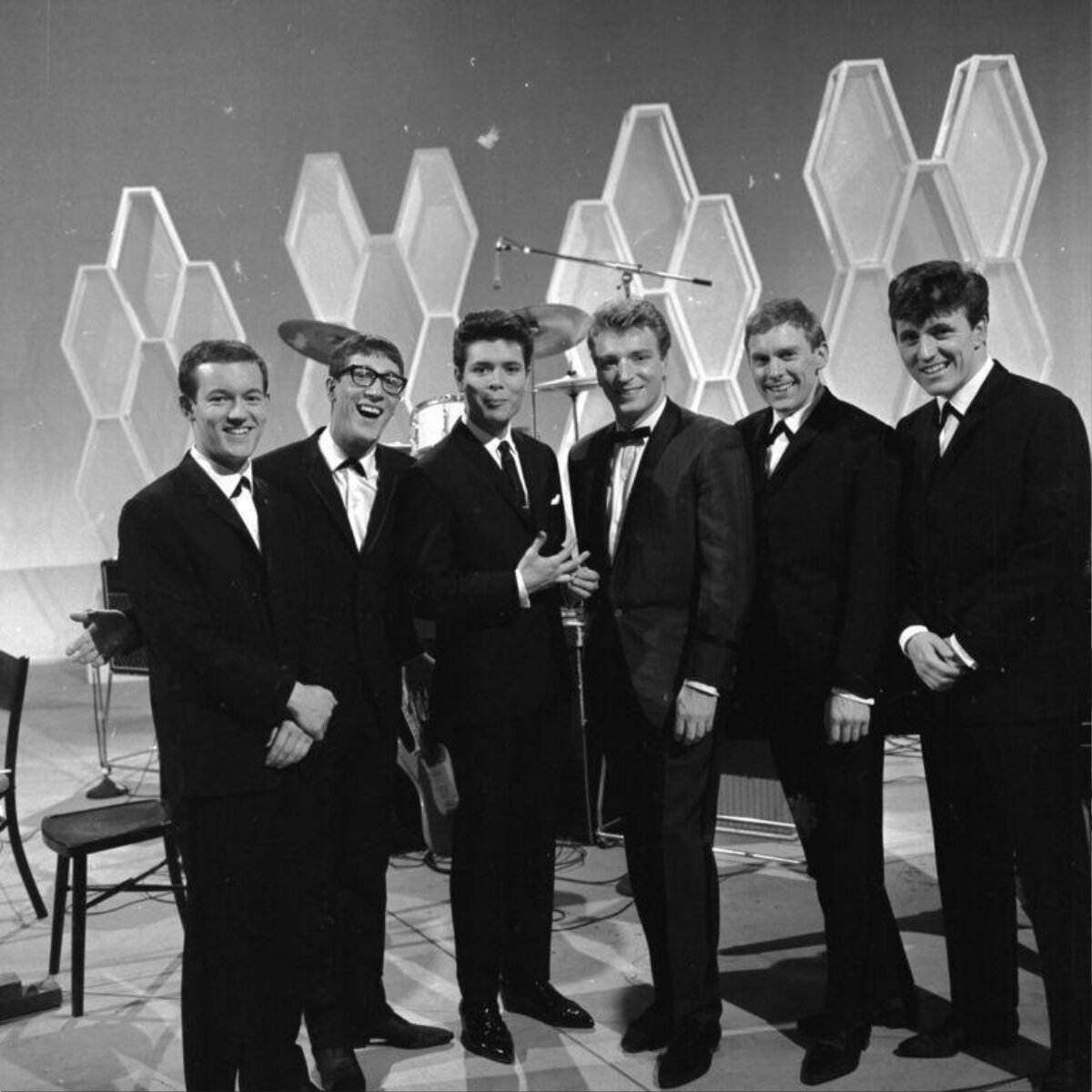 Six Male Musicians On Television Stage