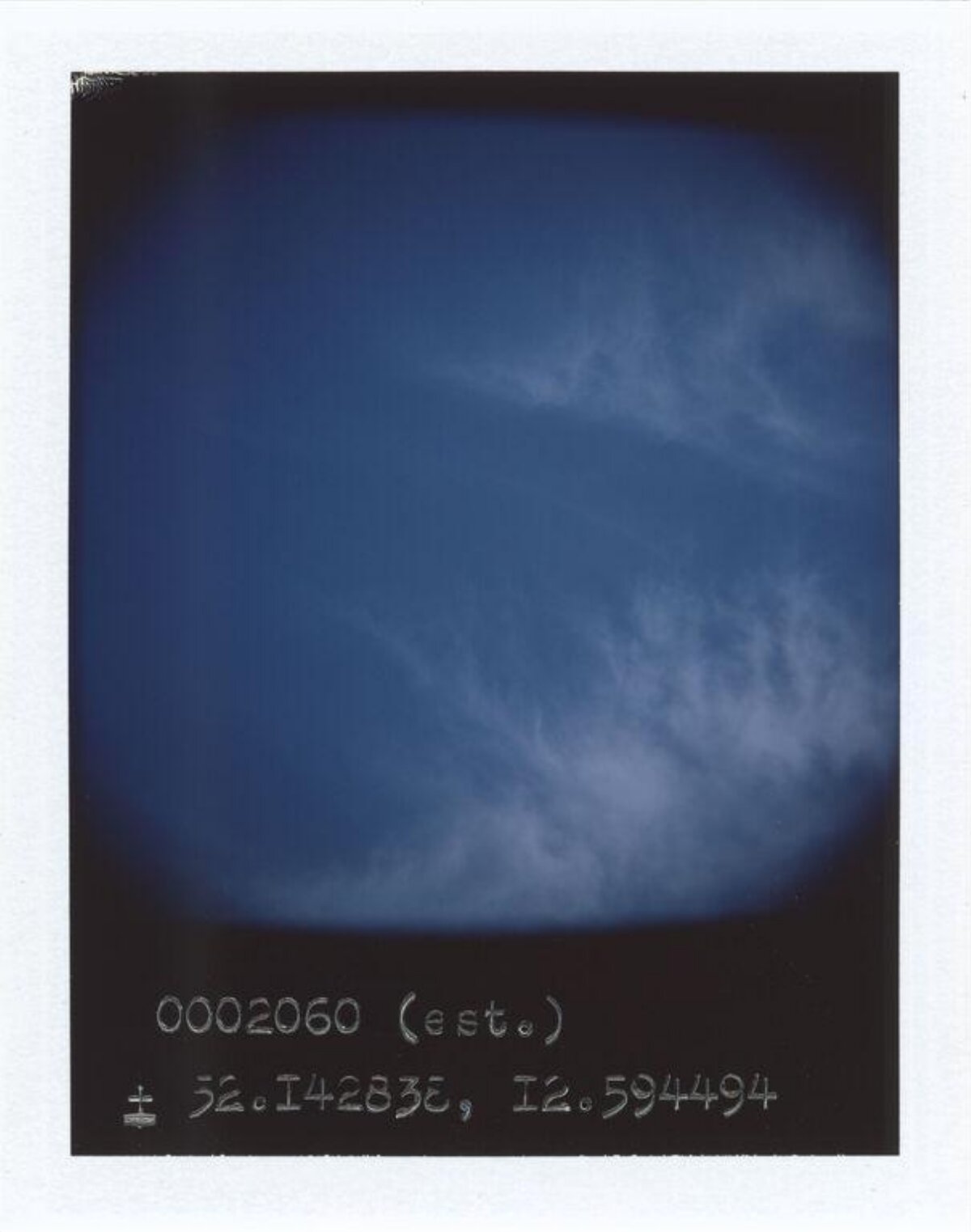 Deep Blue Sky with Wispy Clouds