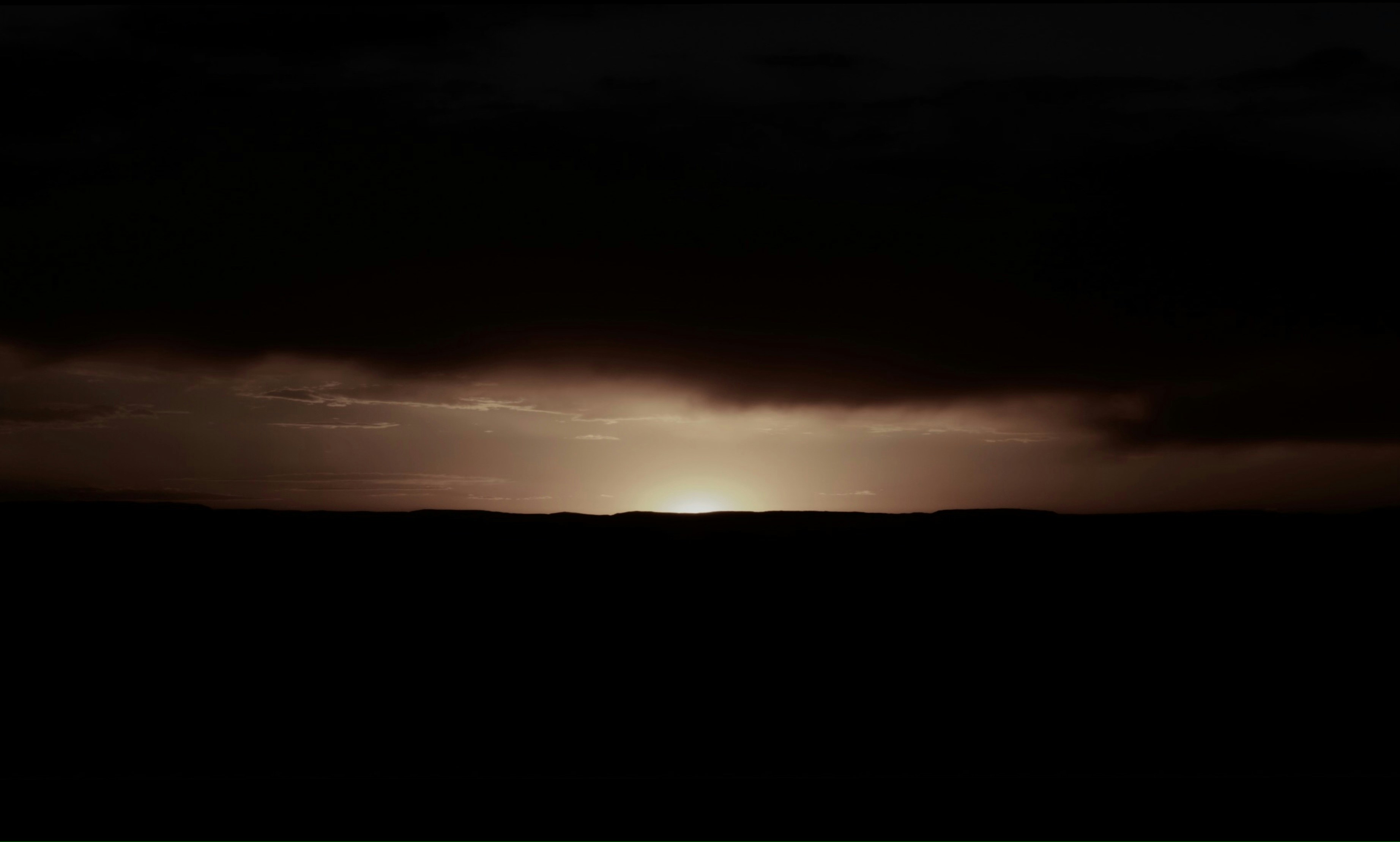 Sunset Behind Dark Horizon