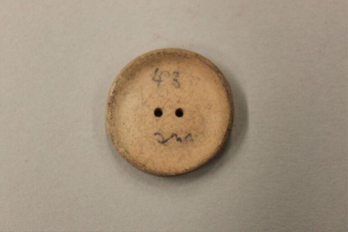 Old Button With Hand Drawn Smiley Face