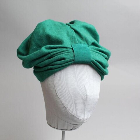 Green Turban Hat on Mannequin Head