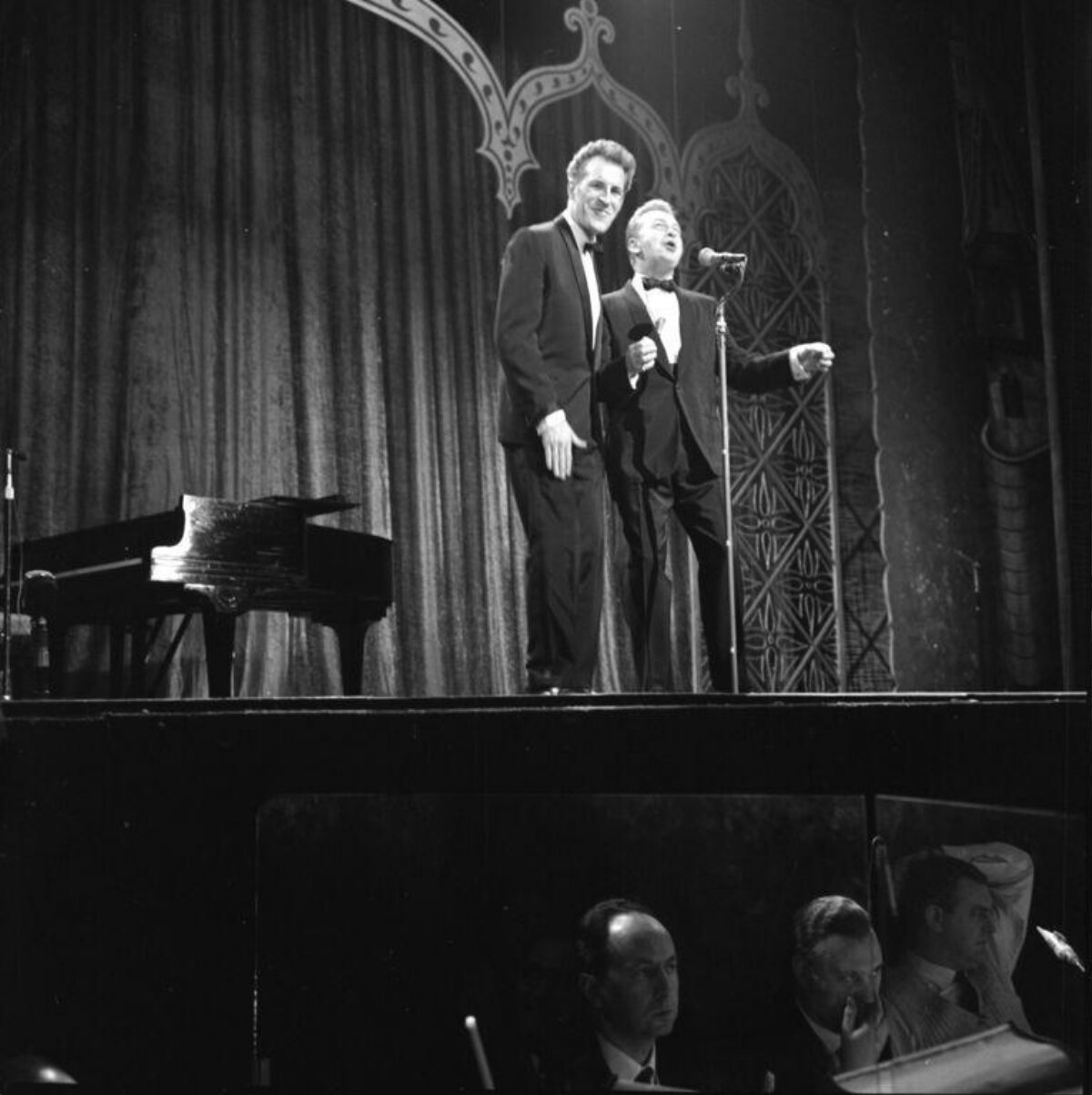 Two Male Performers On Stage