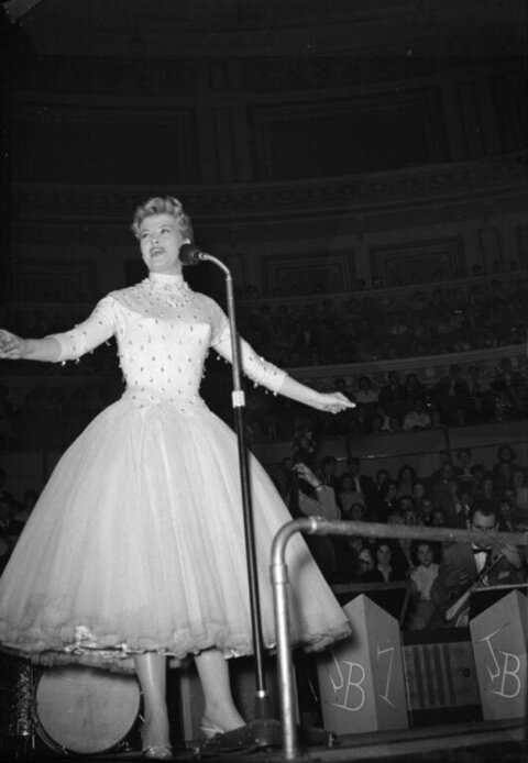 Female Singer Performing on Stage