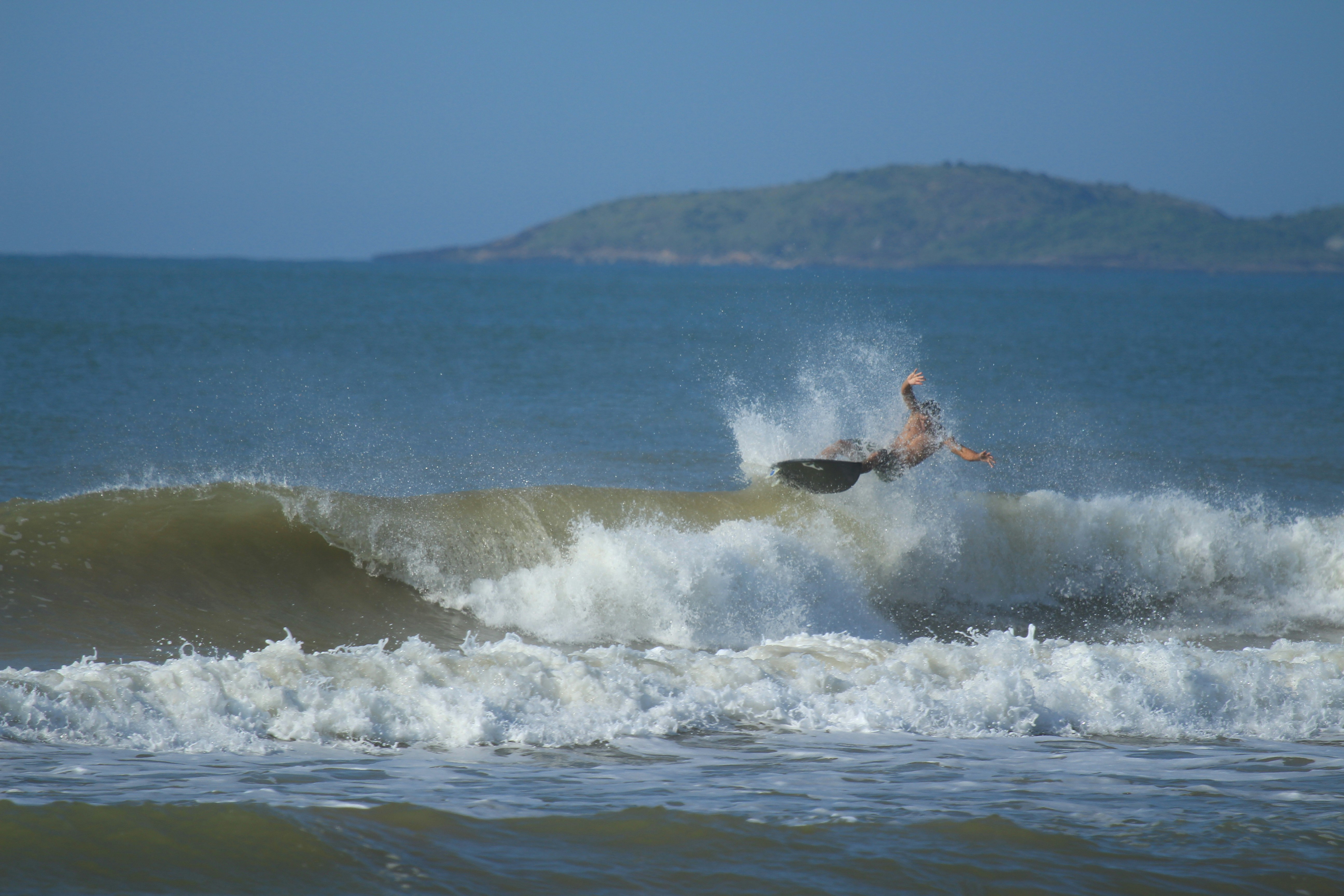 Surfer Wiping Out On Ocean Wave