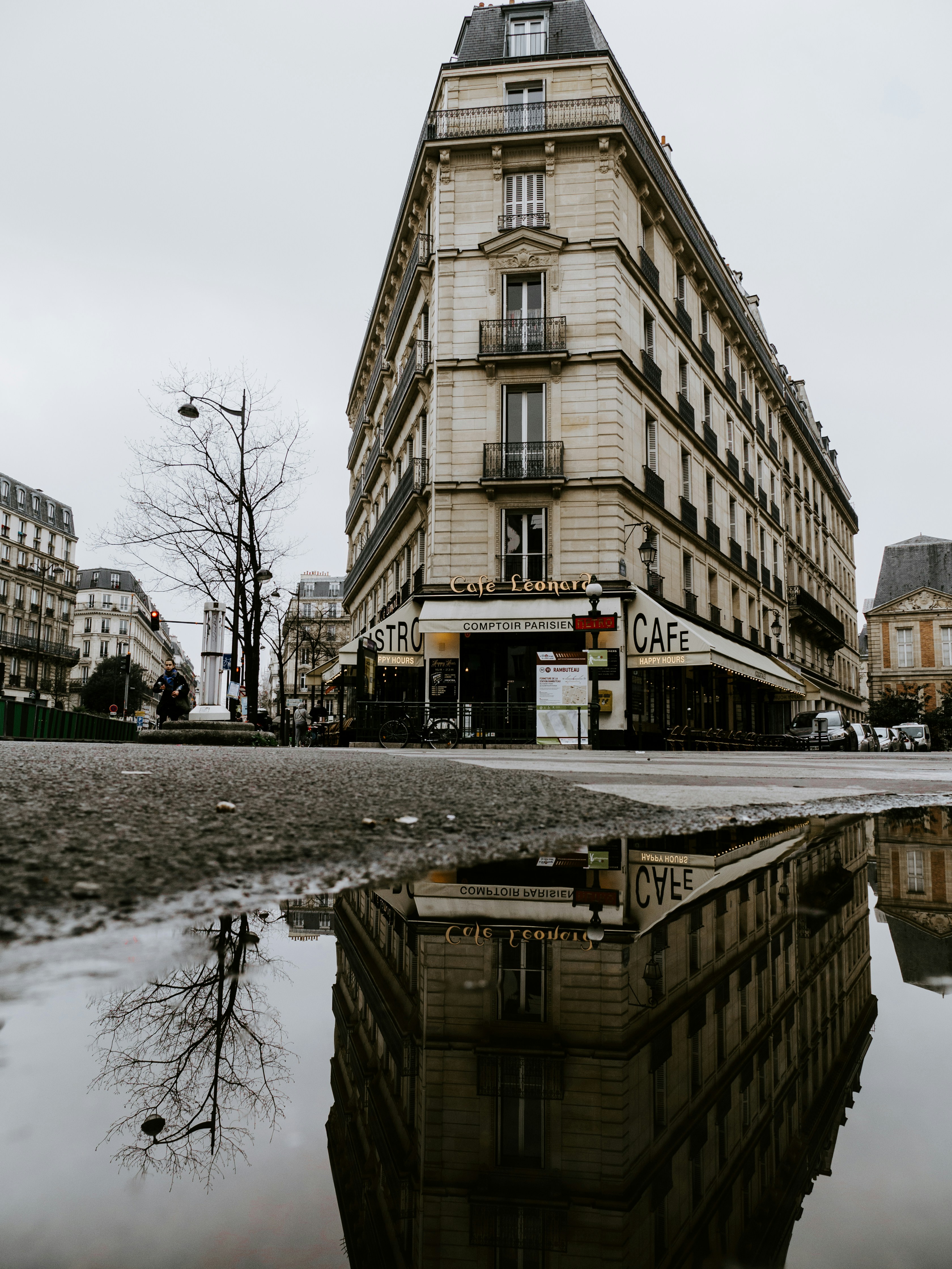 Parisian Corner Cafe Puddle Reflection
