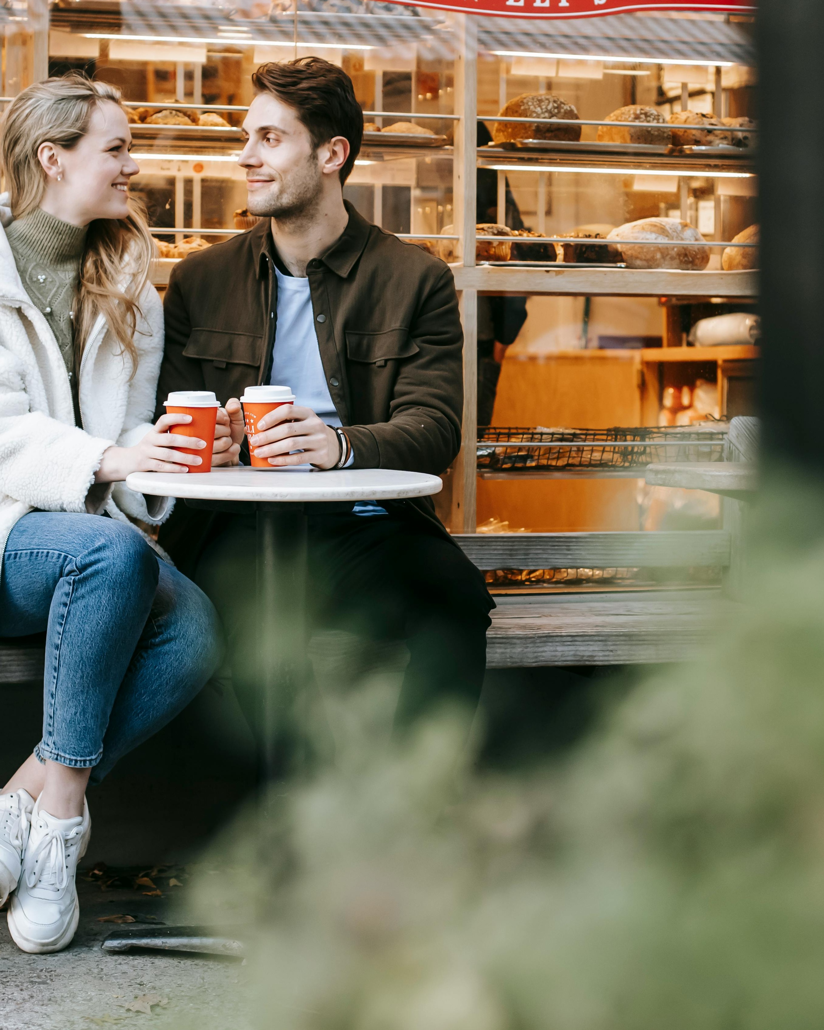 Couple Enjoying Coffee at Bakery