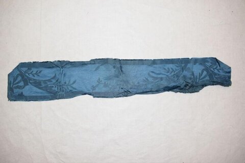 Folded Blue Patterned Fabric Strip