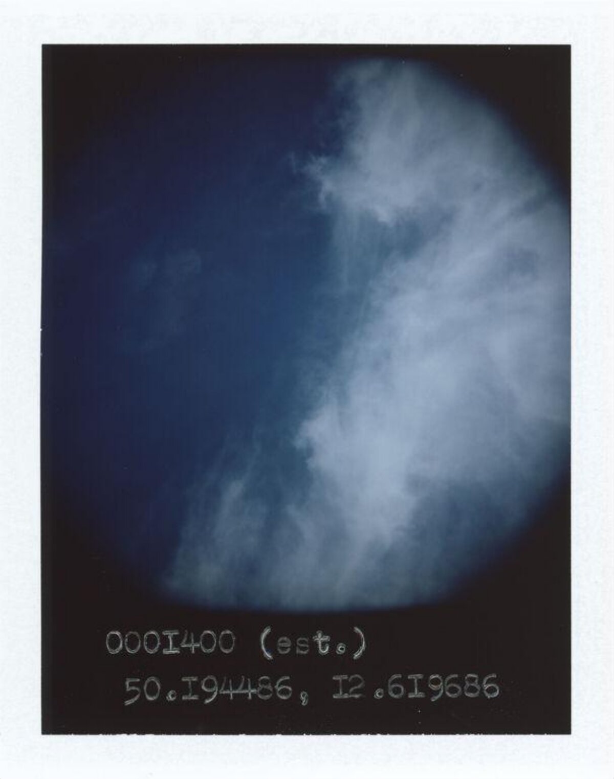 Cloudy Sky with Handwritten Coordinates