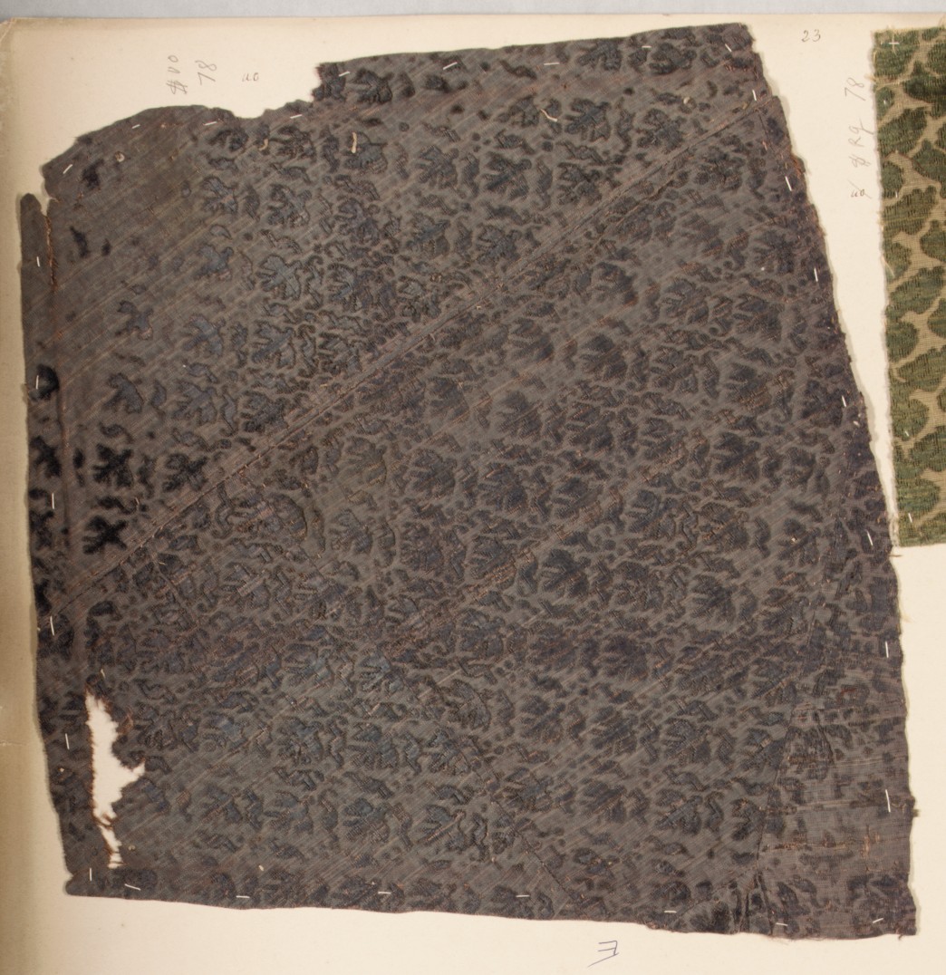 Antique Dark Patterned Textile Fragment