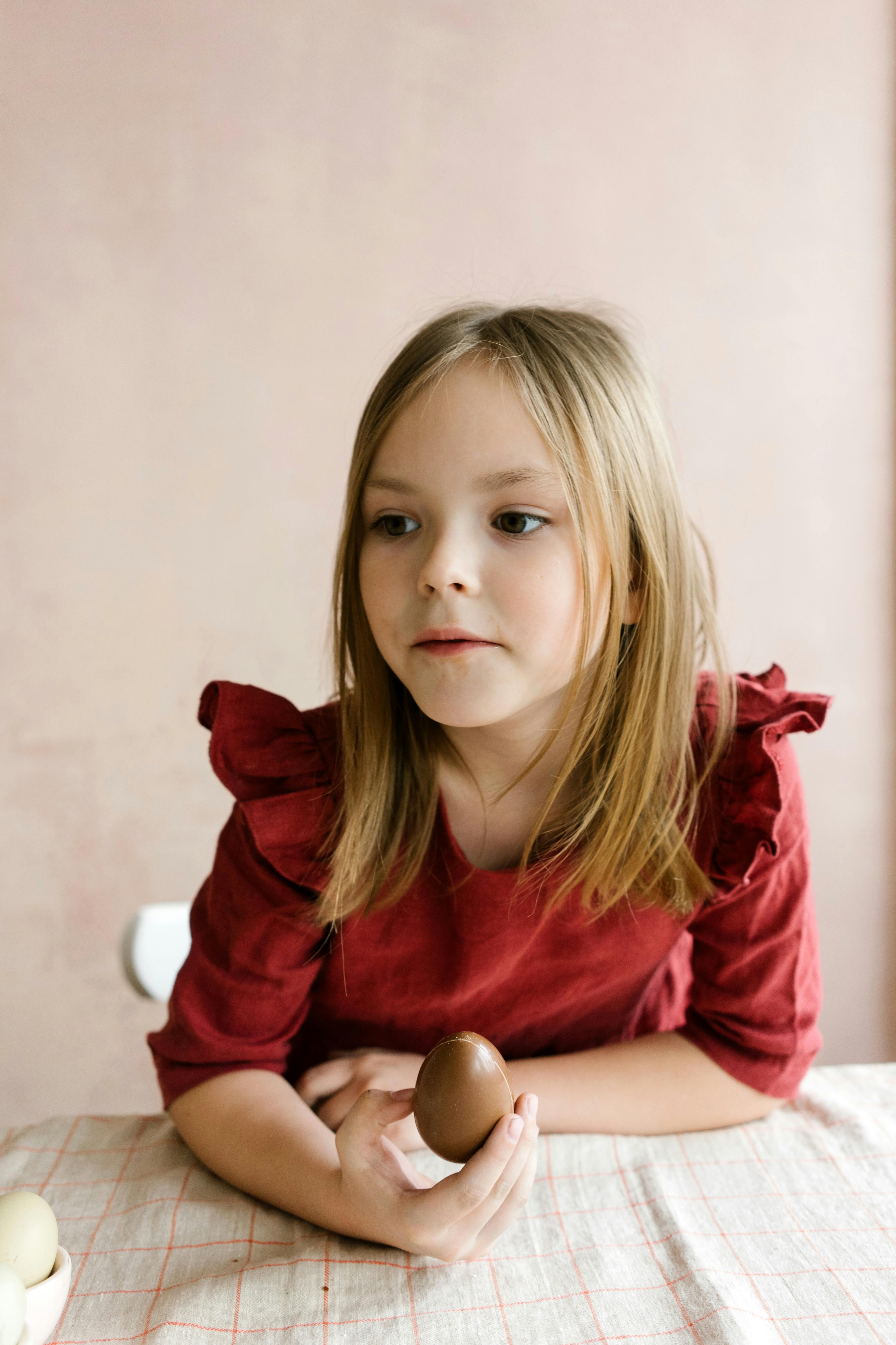 Girl Holding Chocolate Easter Egg
