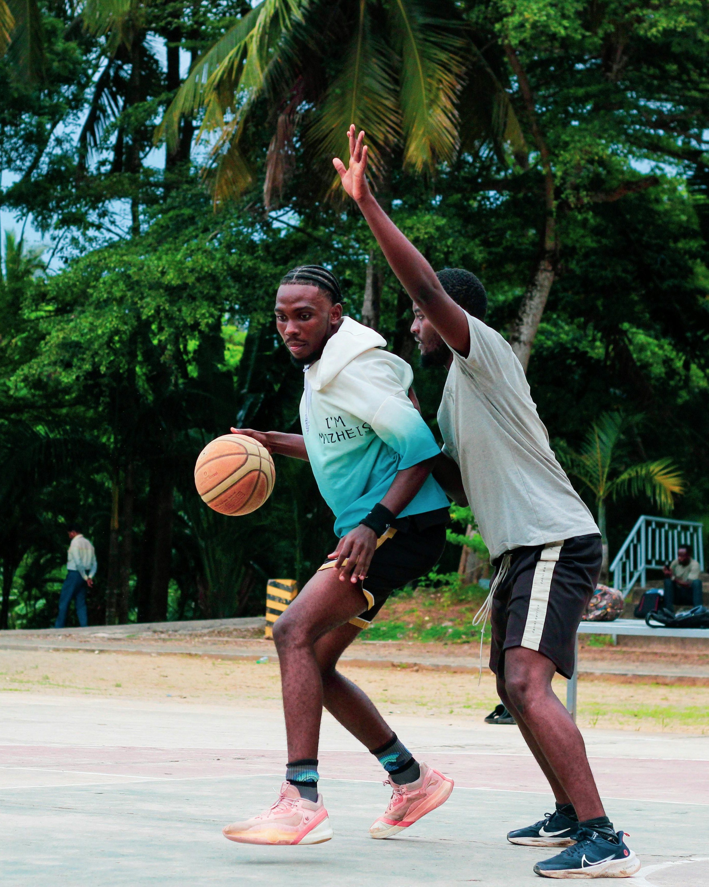 Two Men Playing Outdoor Basketball