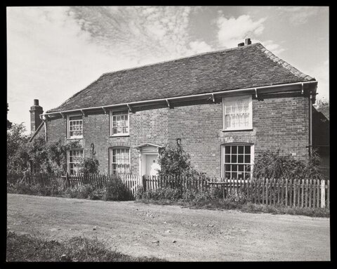 Old Brick Cottage by Roadside