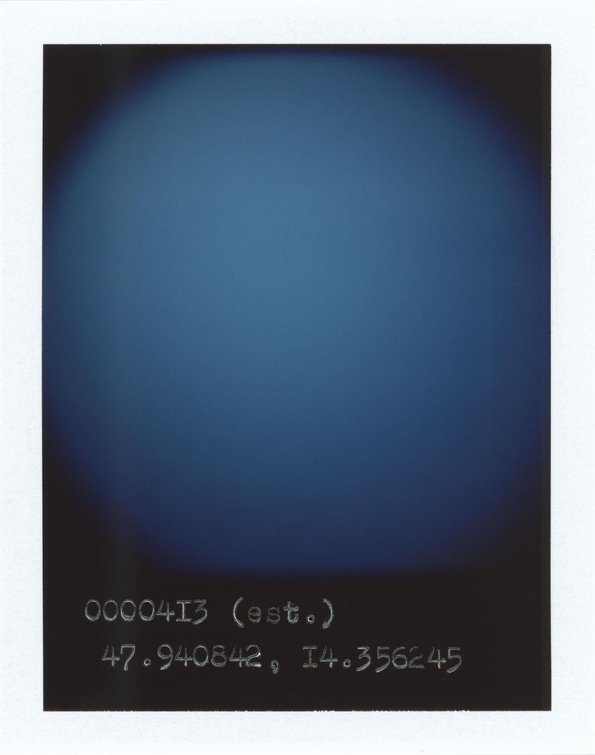 Polaroid With Handwritten Coordinates