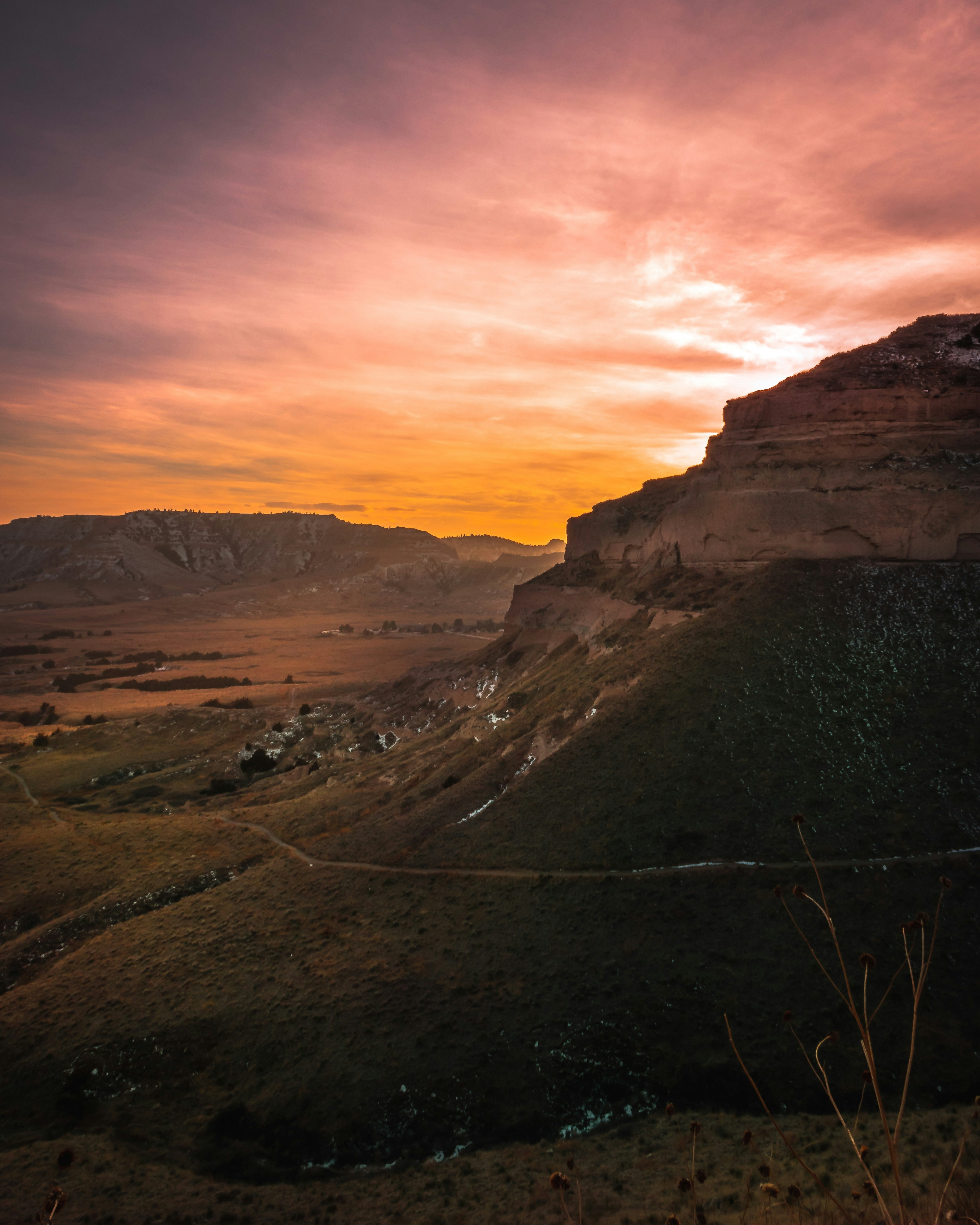 Sunset Over Bluff Valley Landscape