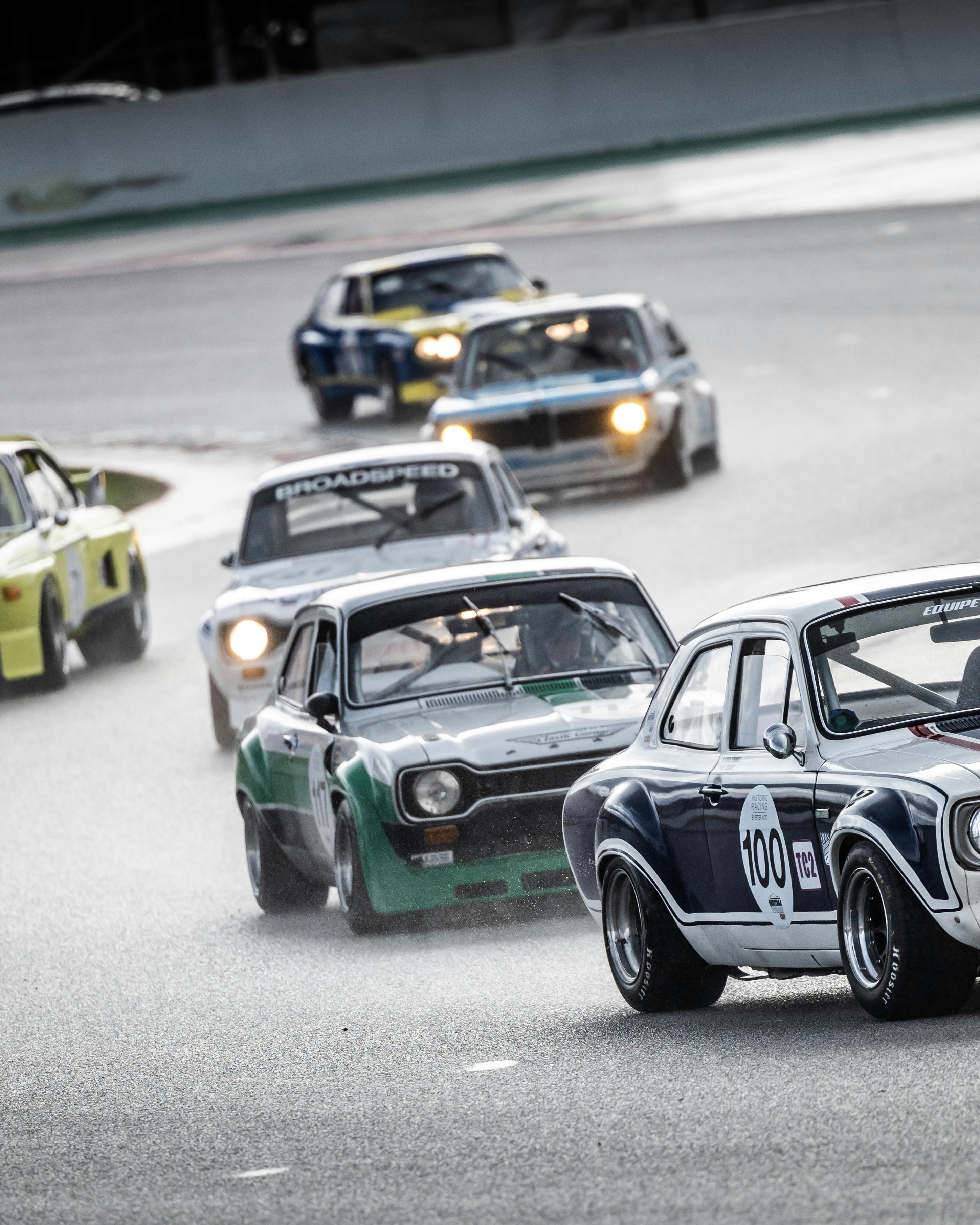 Vintage Race Cars Competing on Track