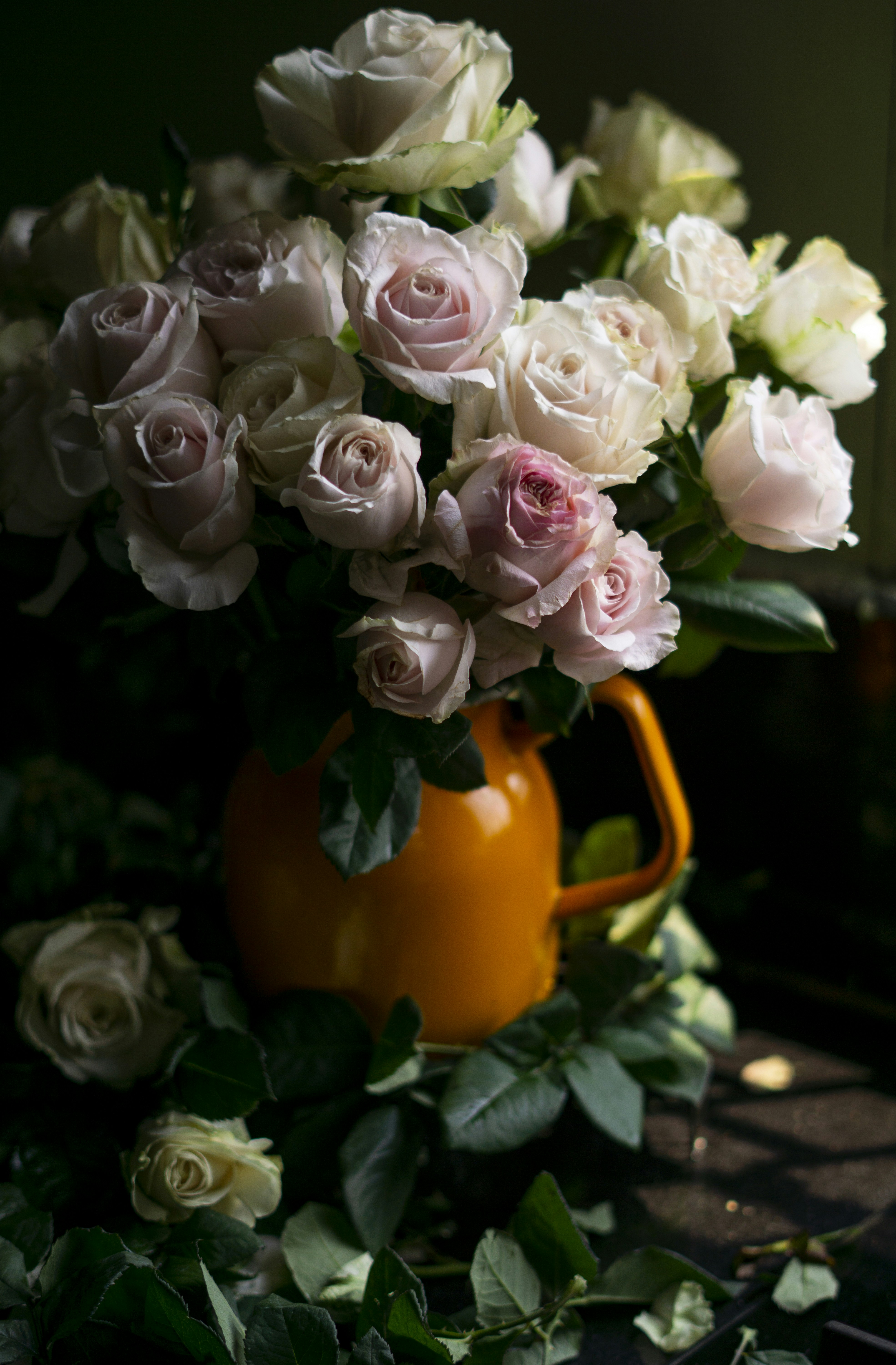 Bouquet of Roses in Orange Pitcher