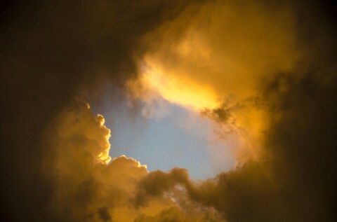 Golden Clouds Framing Blue Sky