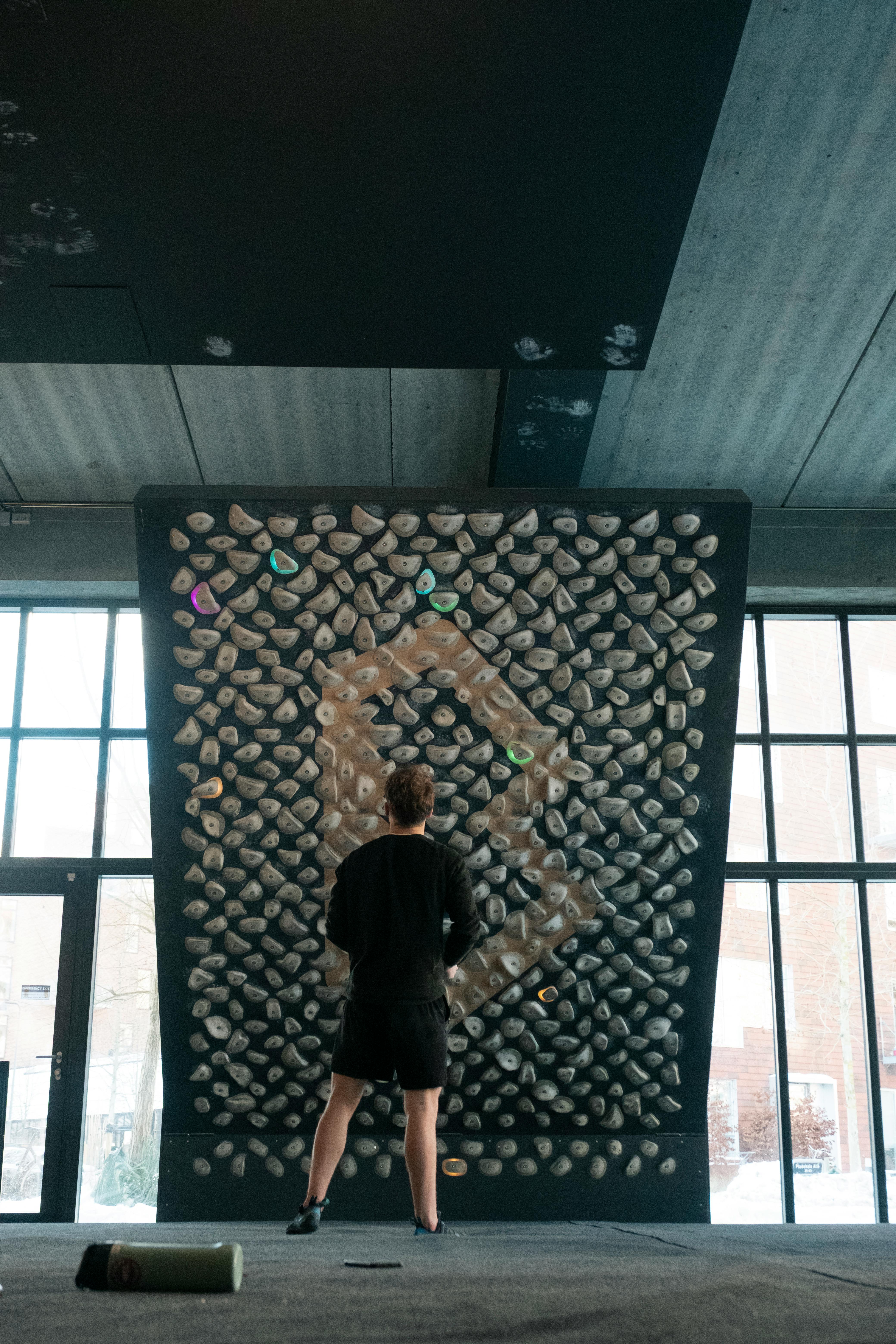 Man at Indoor Climbing Wall
