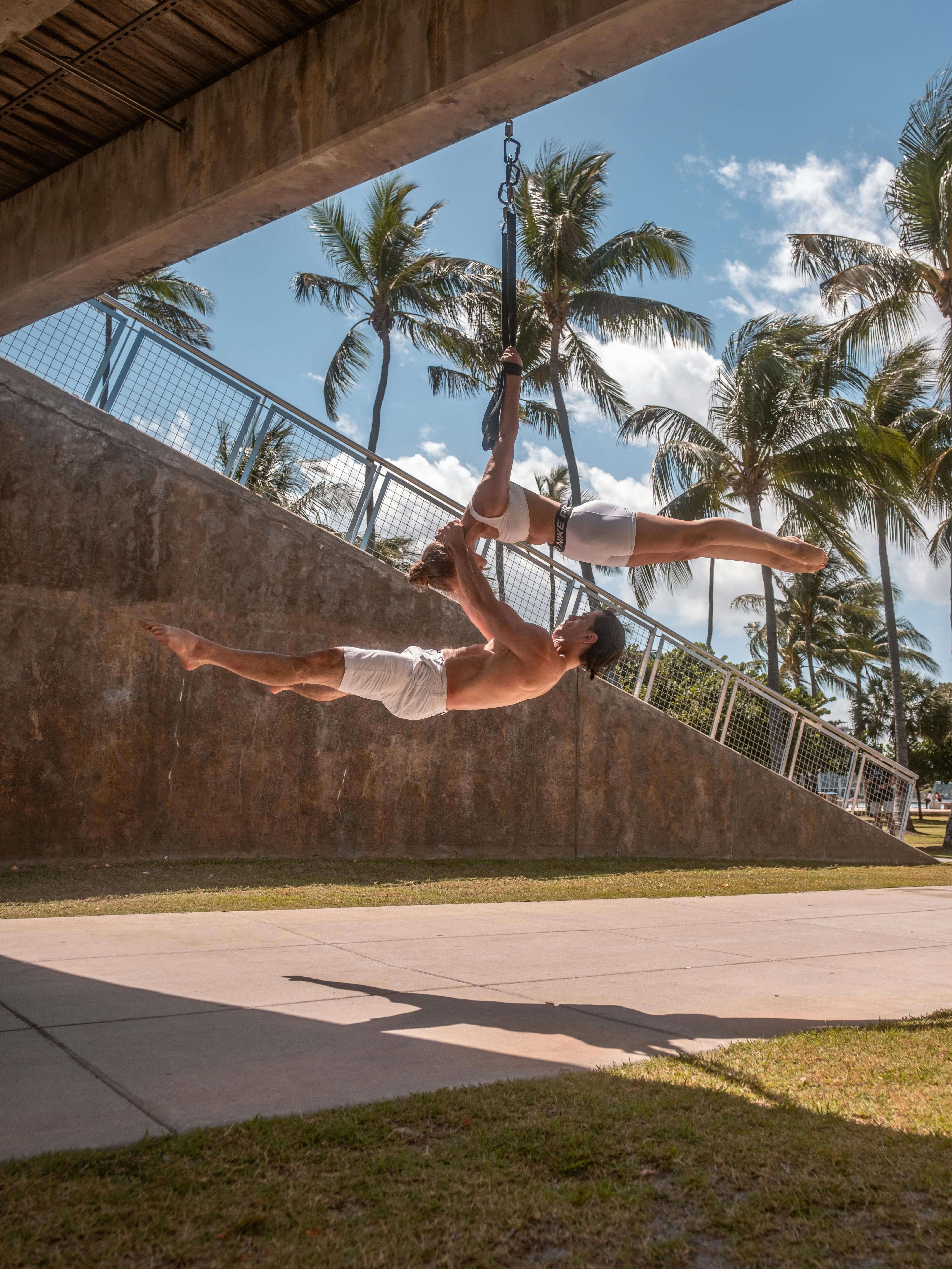 Partner Acrobatic Aerial Yoga Outdoors