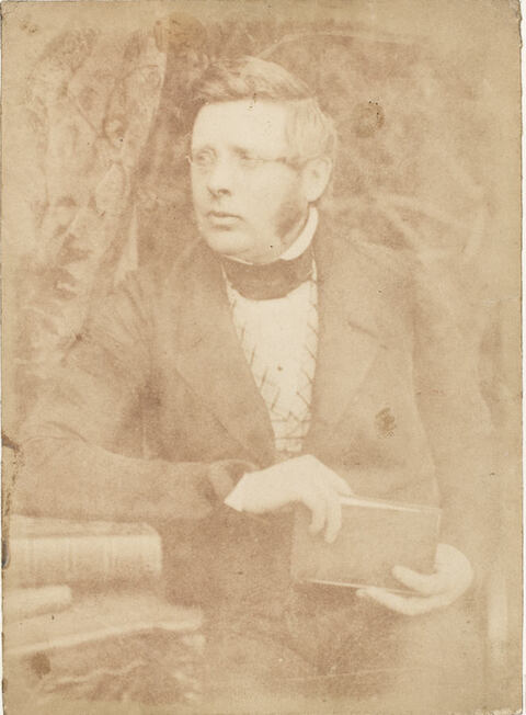 Vintage Portrait of Man Holding Book