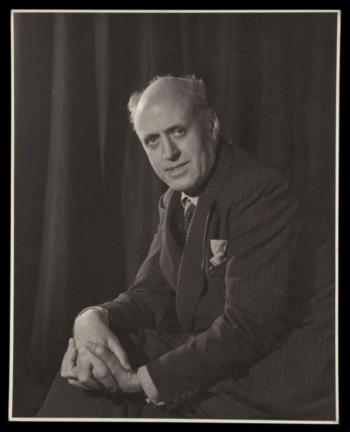 Vintage Seated Man Studio Portrait