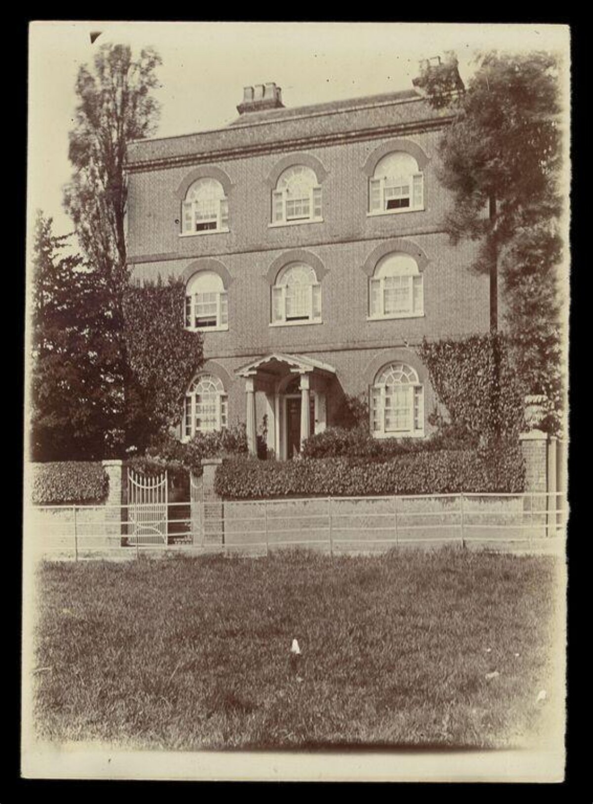 Vintage Photo of Three-Story Brick House