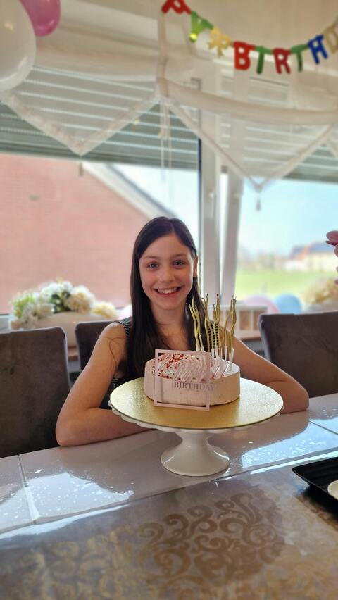 Girl Celebrating Birthday With Cake