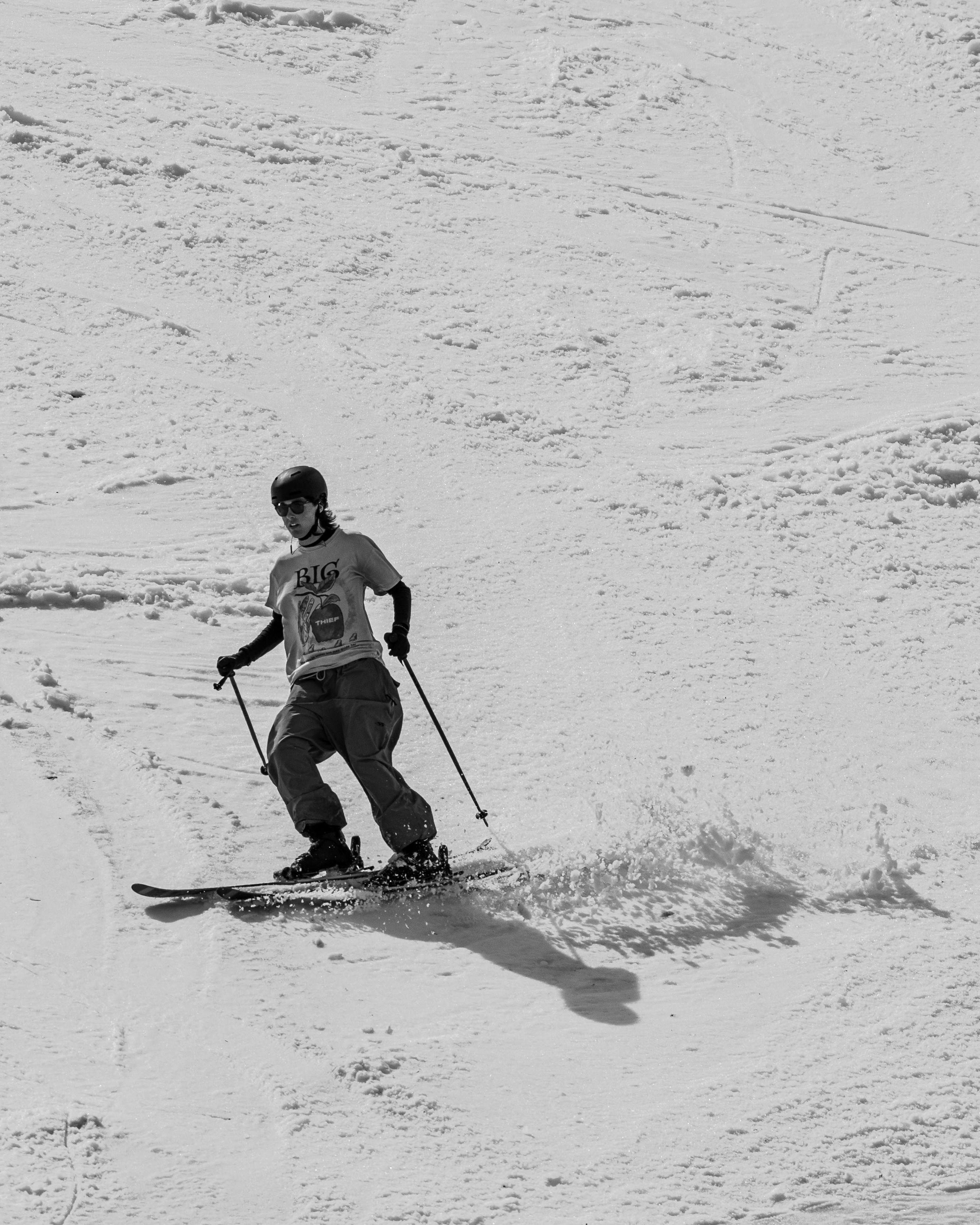 Skier Skiing Down Snowy Slope