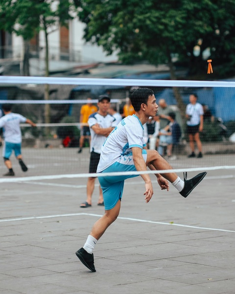 Man playing sepak takraw outdoors
