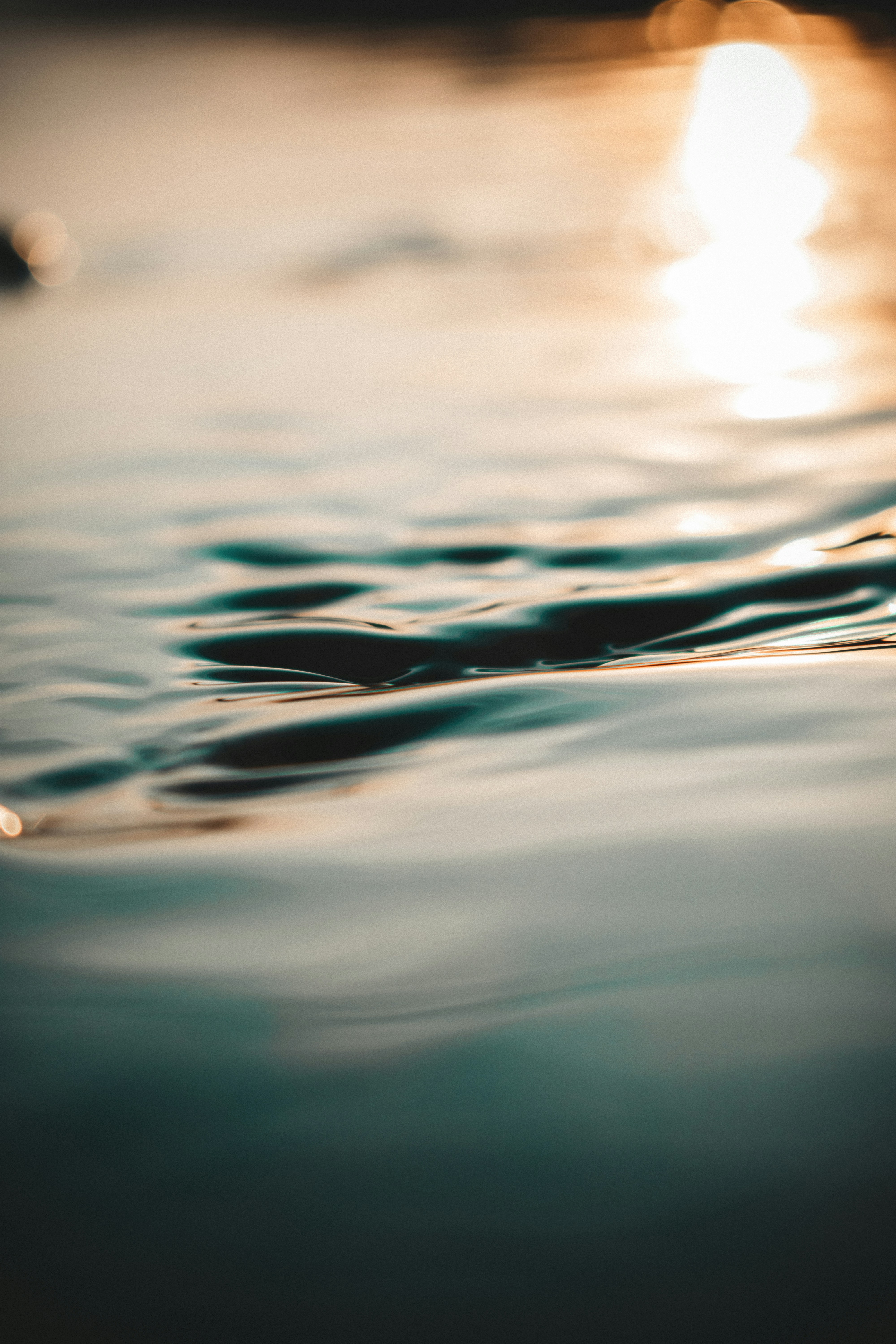 Sunlit Rippling Water Surface