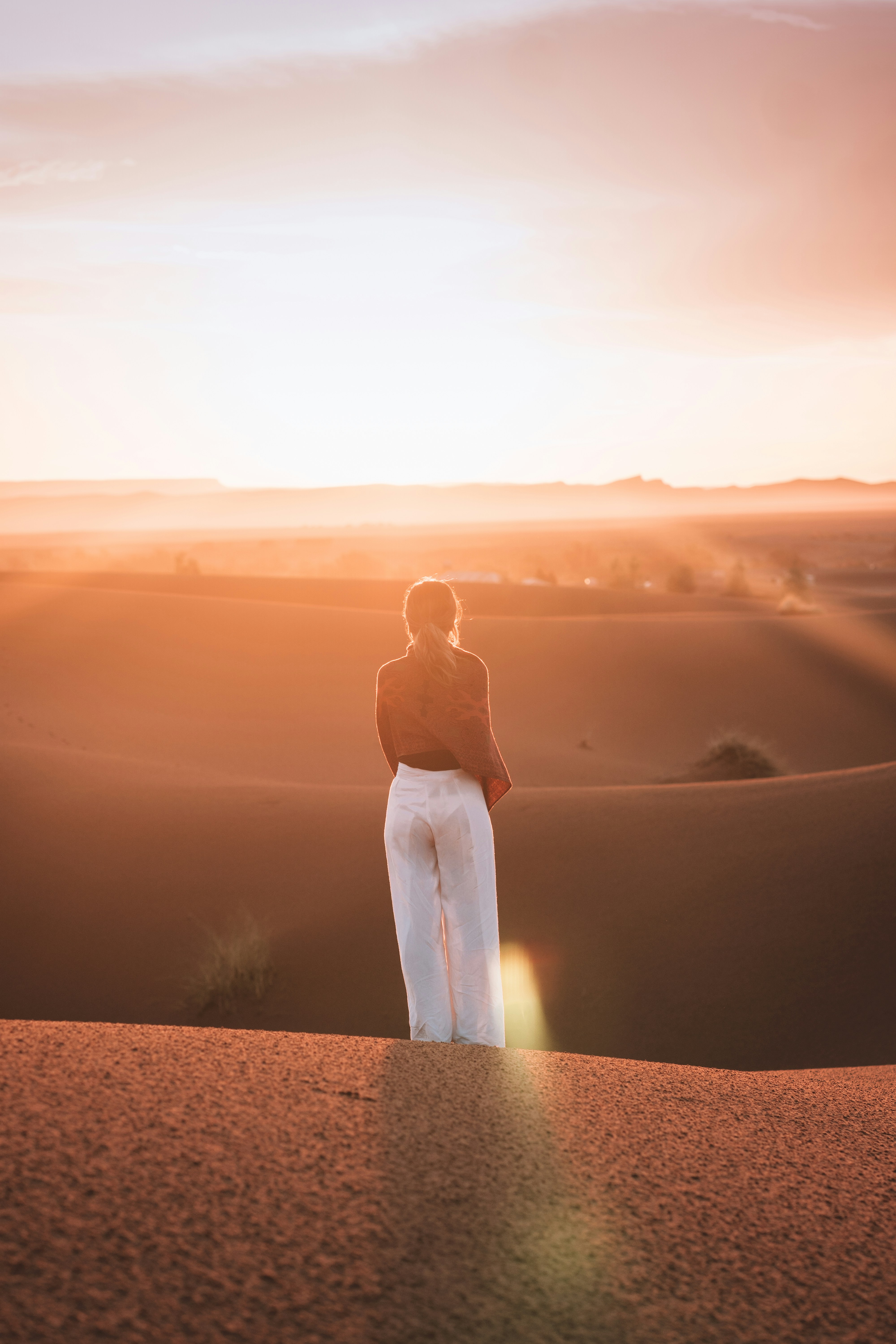 Woman Watching Desert Sunset
