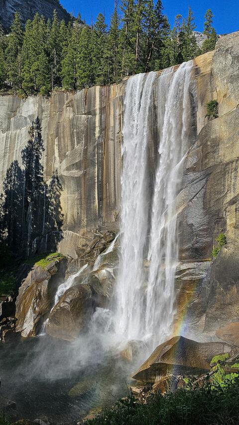 Mountain Waterfall with Rainbow