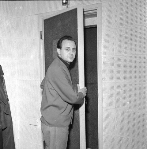 Man at Soundproof Booth Door