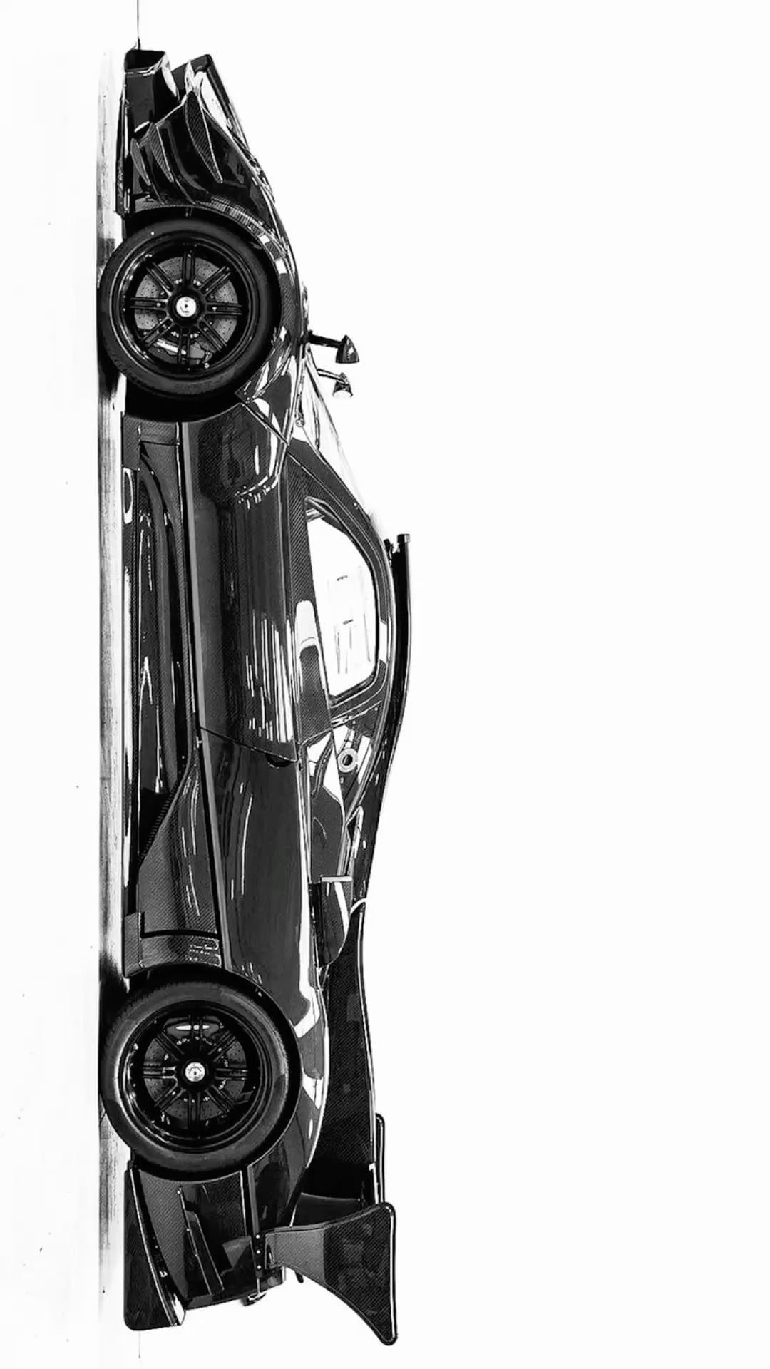 Black Carbon Fiber Sports Car Side View