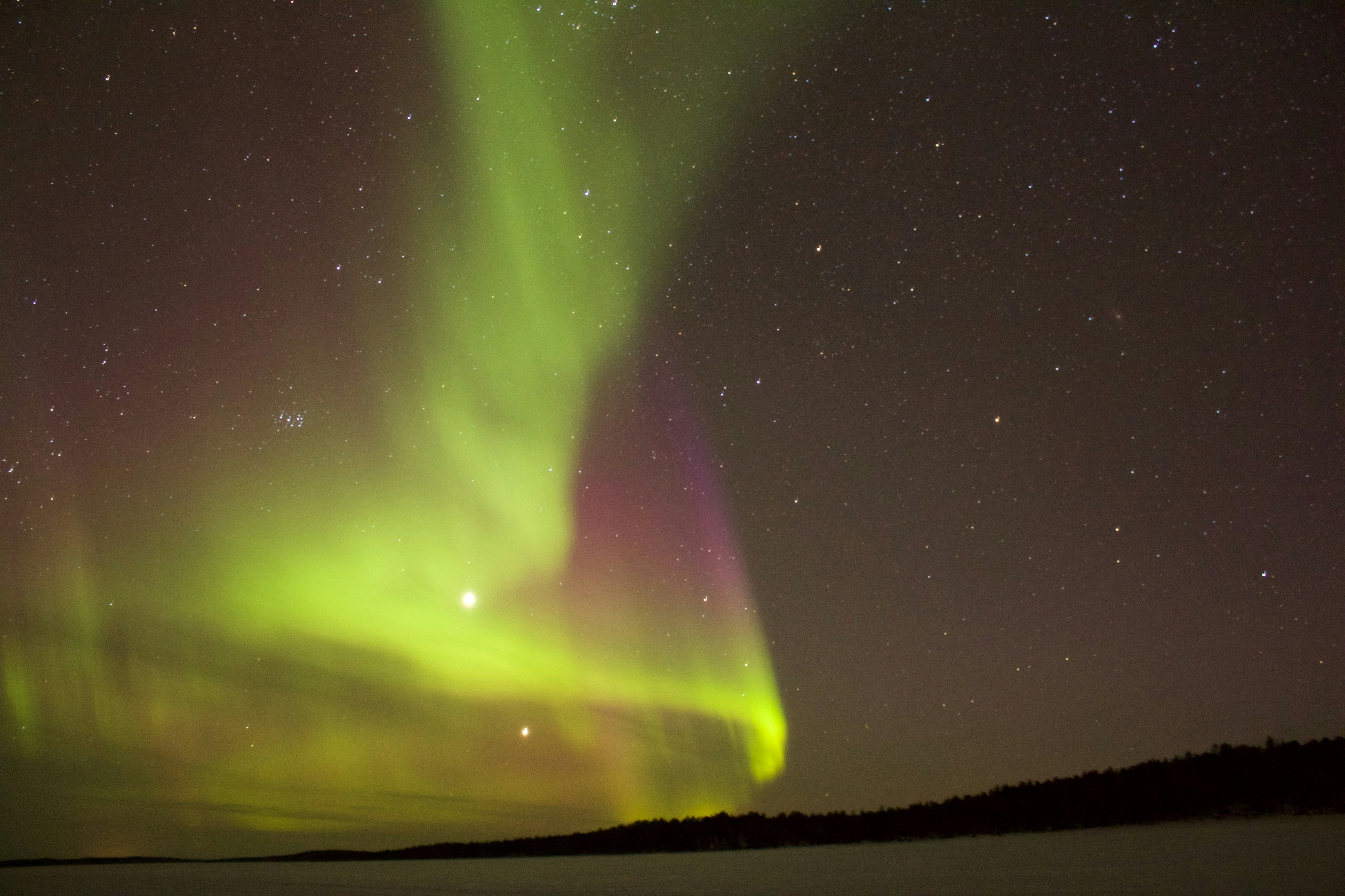 Aurora Borealis Over Frozen Lake
