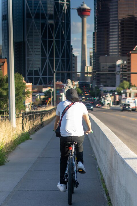 Cyclist Riding Into Downtown Calgary