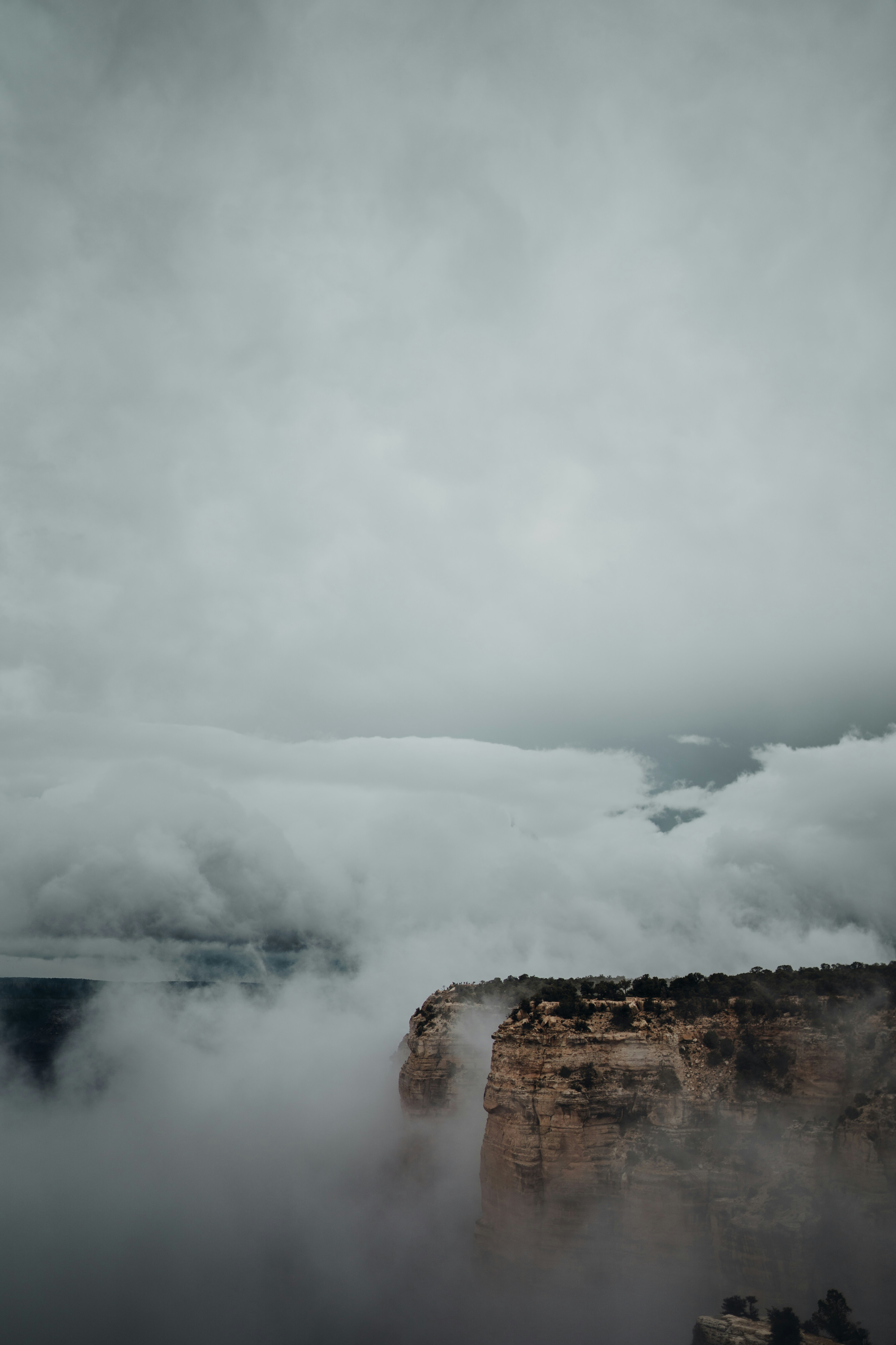 Cloud-Enshrouded Canyon Cliffs