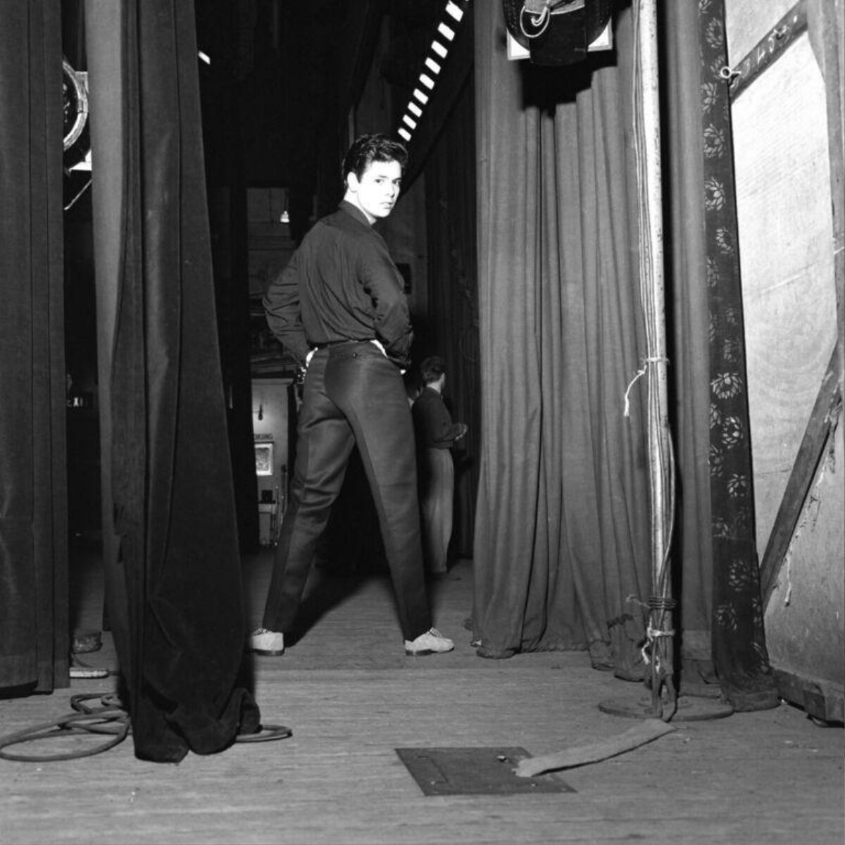 Young Man Standing Backstage