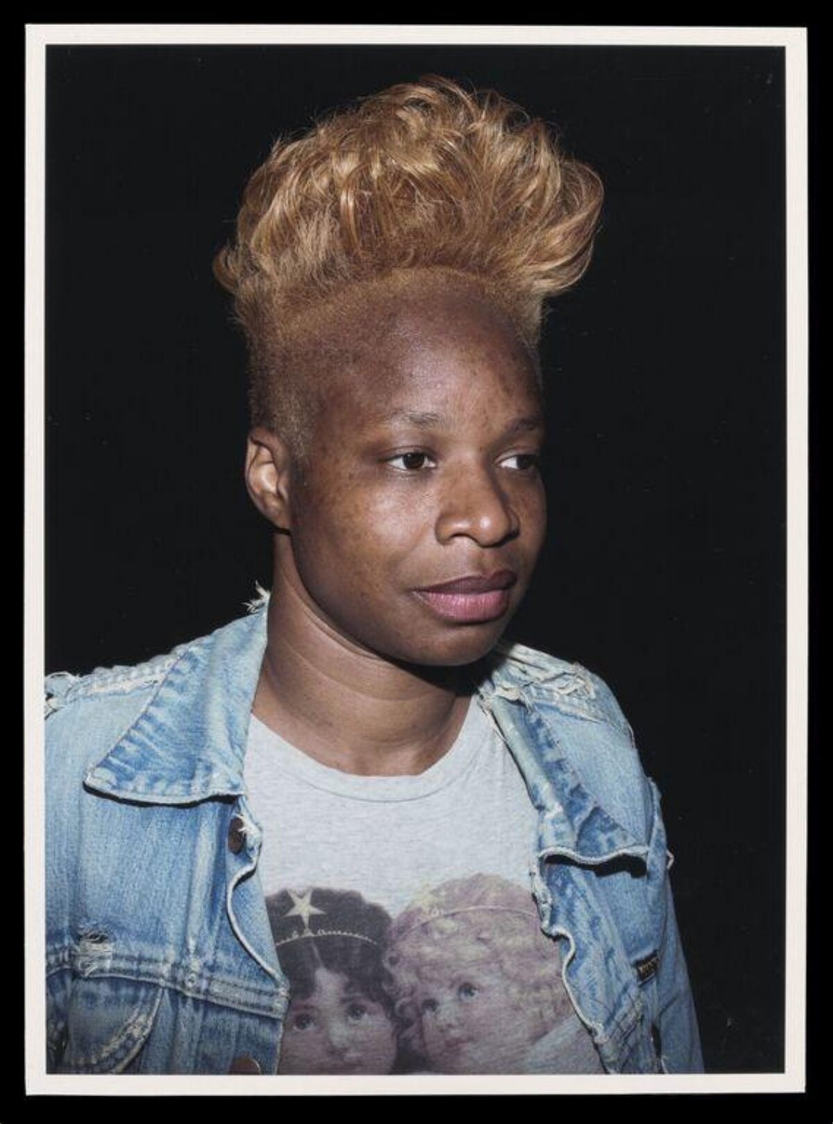 Studio Portrait of Person with Blonde Mohawk