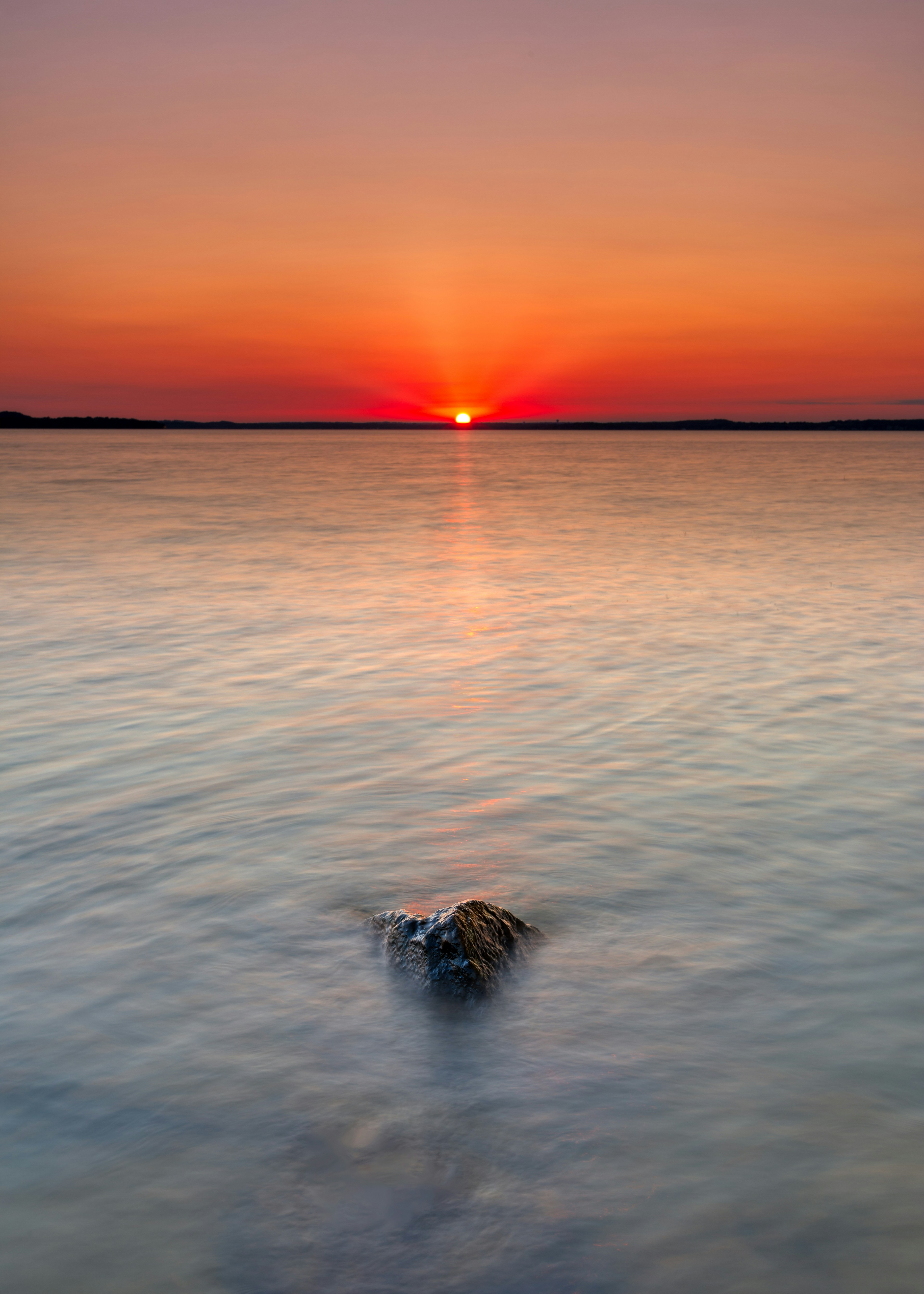 Sunset Over Calm Water