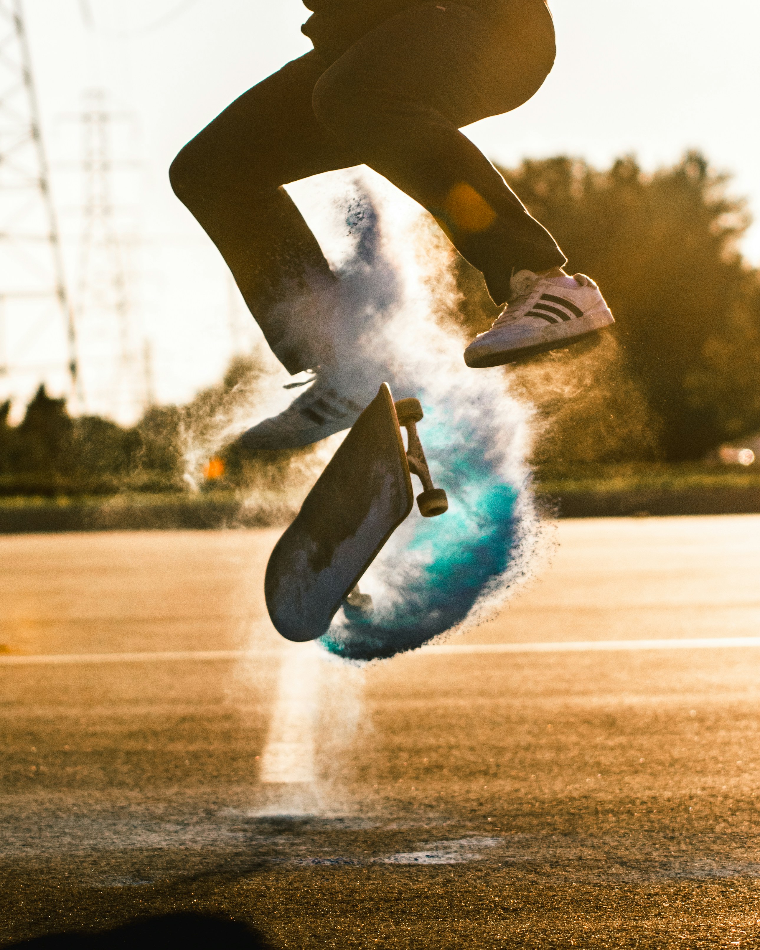 Skateboarder Mid-Air Trick at Sunset