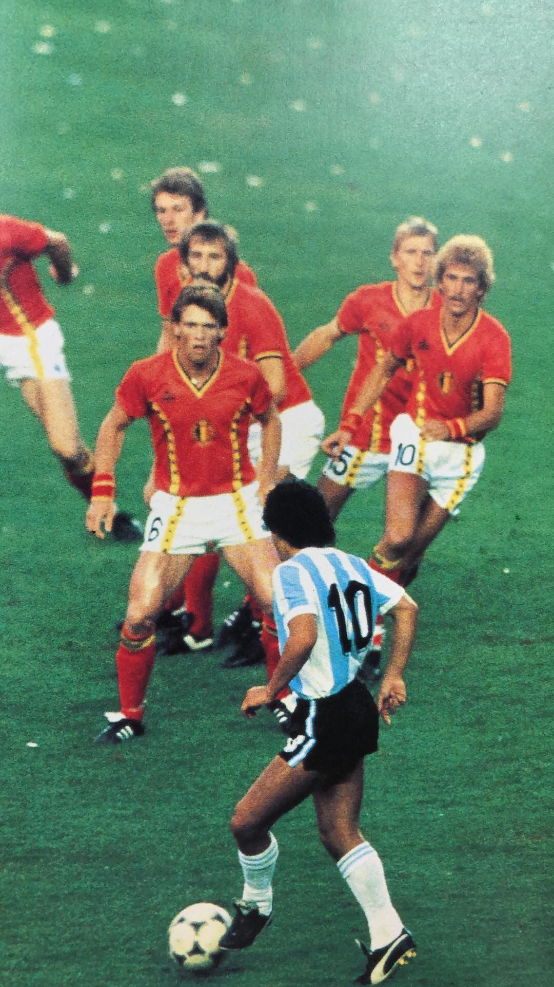 Maradona dribbles against Belgium in soccer match