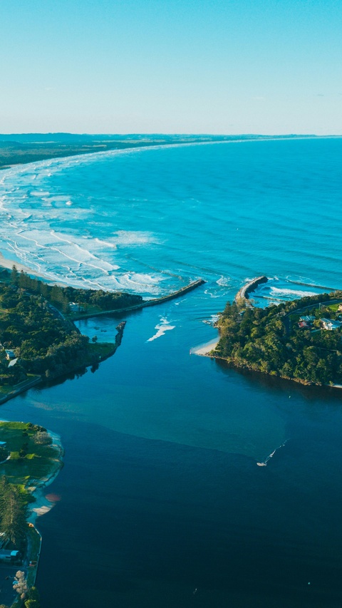 Aerial View of River Mouth Meeting Ocean